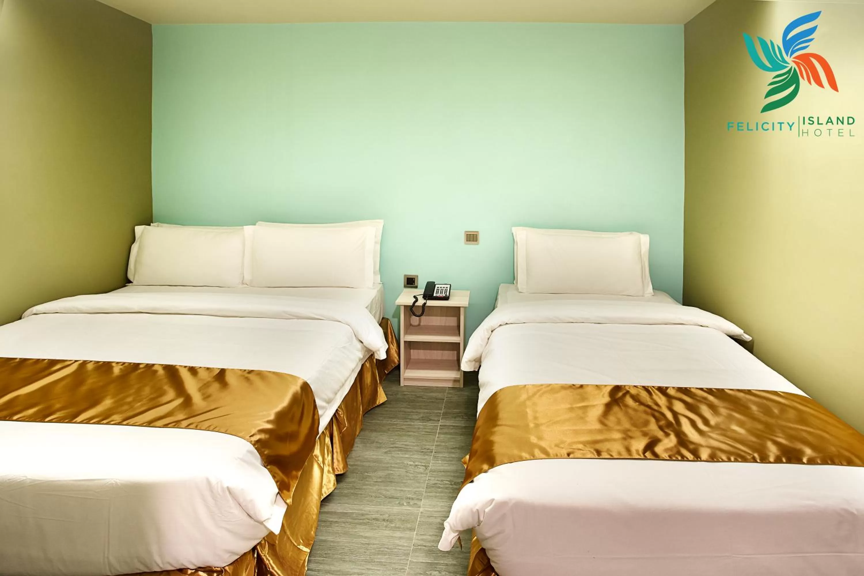 Bed in Felicity Island Hotel