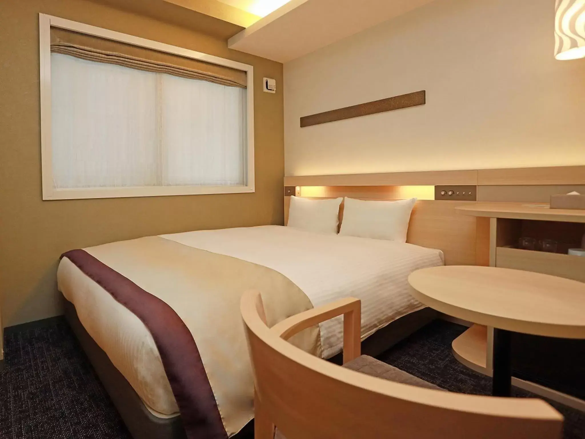 Bed in Urban Hotel Kyoto Shijo Premium