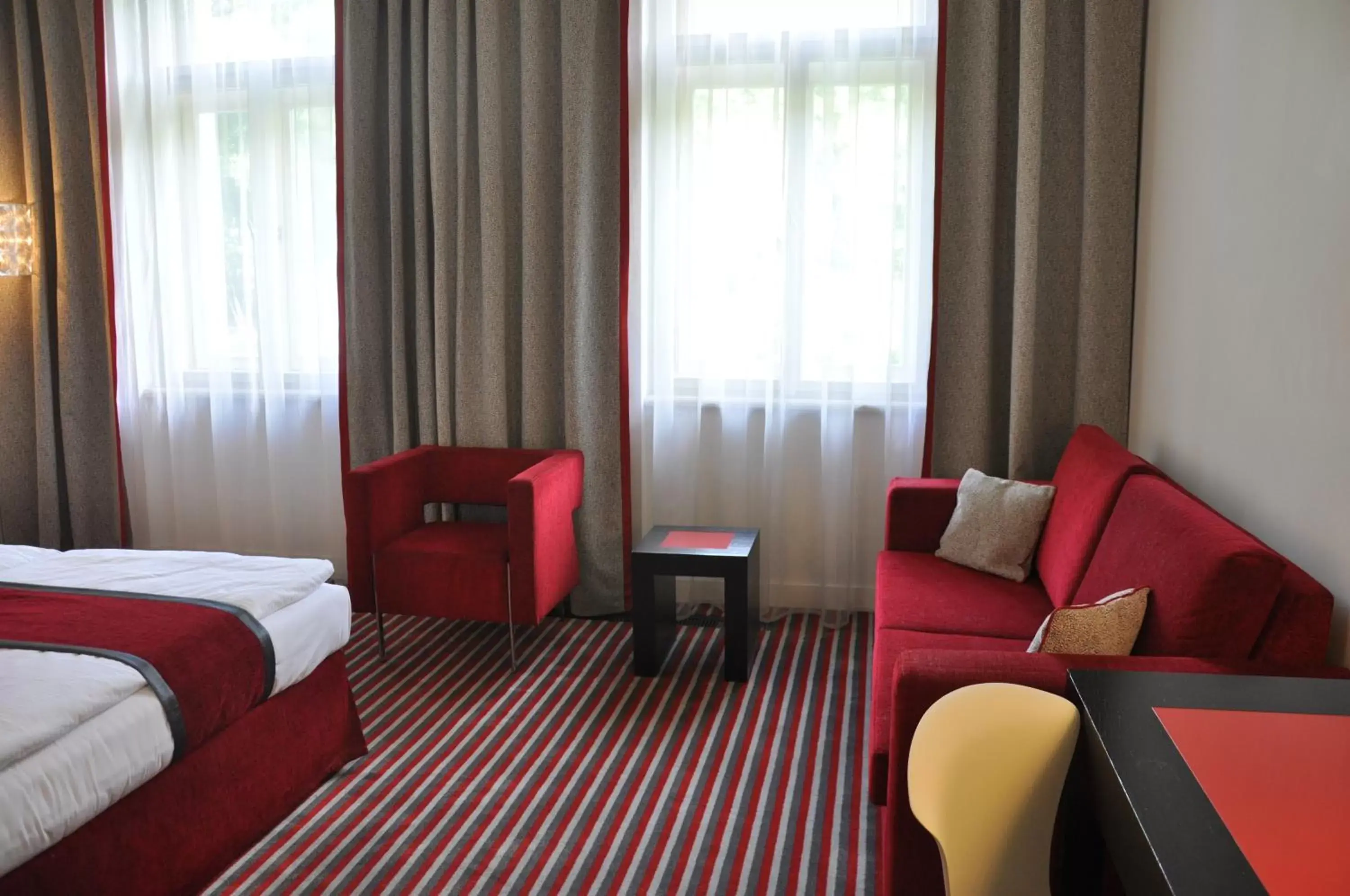 Seating Area in Red & Blue Design Hotel Prague