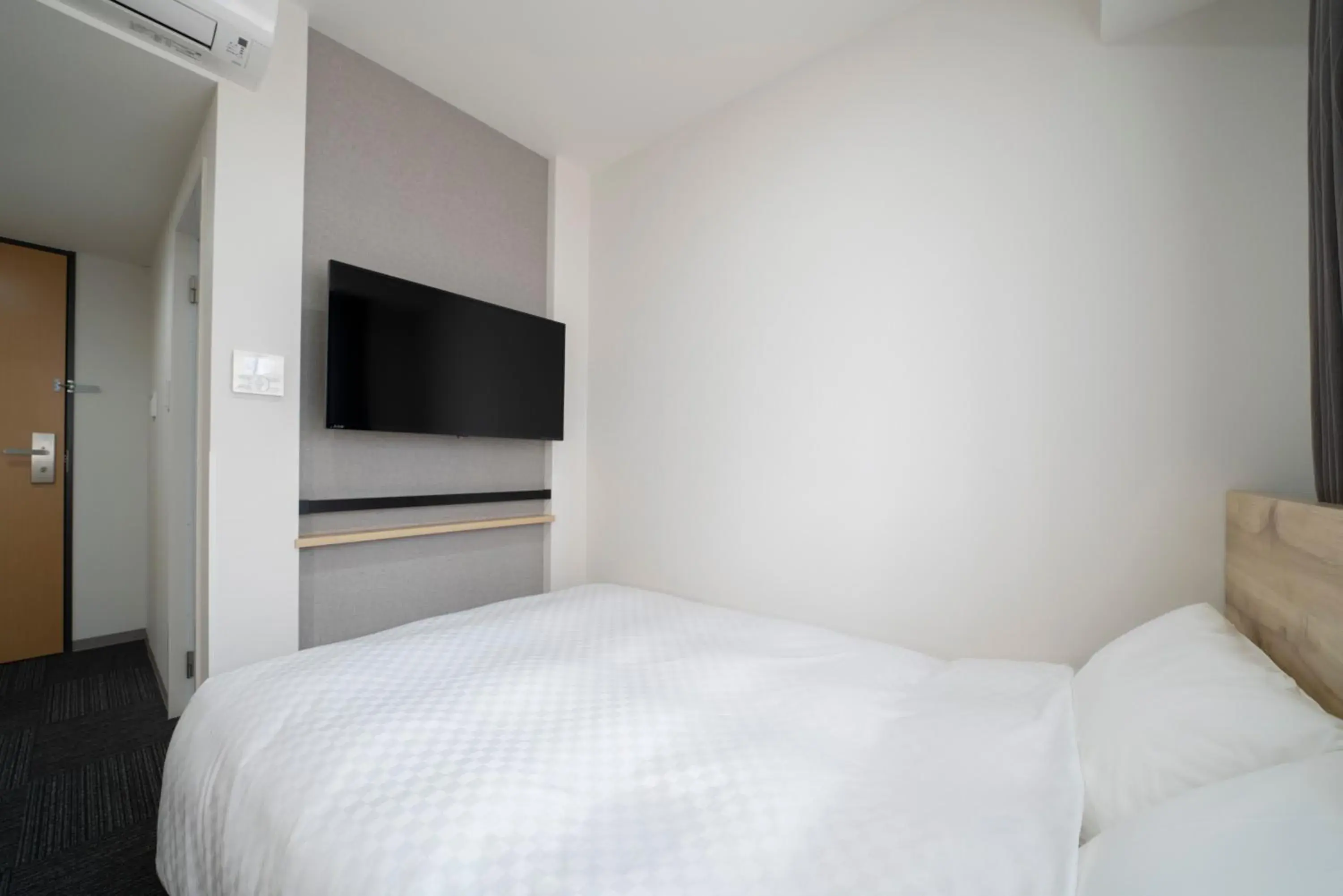 Bed in Washington R&B Hotel Nagoya Shinkansenguchi Bed in Washington R&B Hotel Nagoya Shinkansenguchi