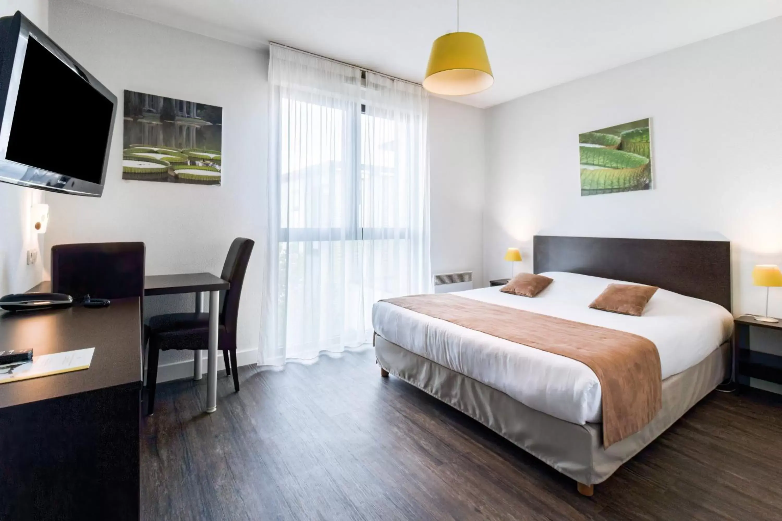 Bed in All Suites Pau – Zénith