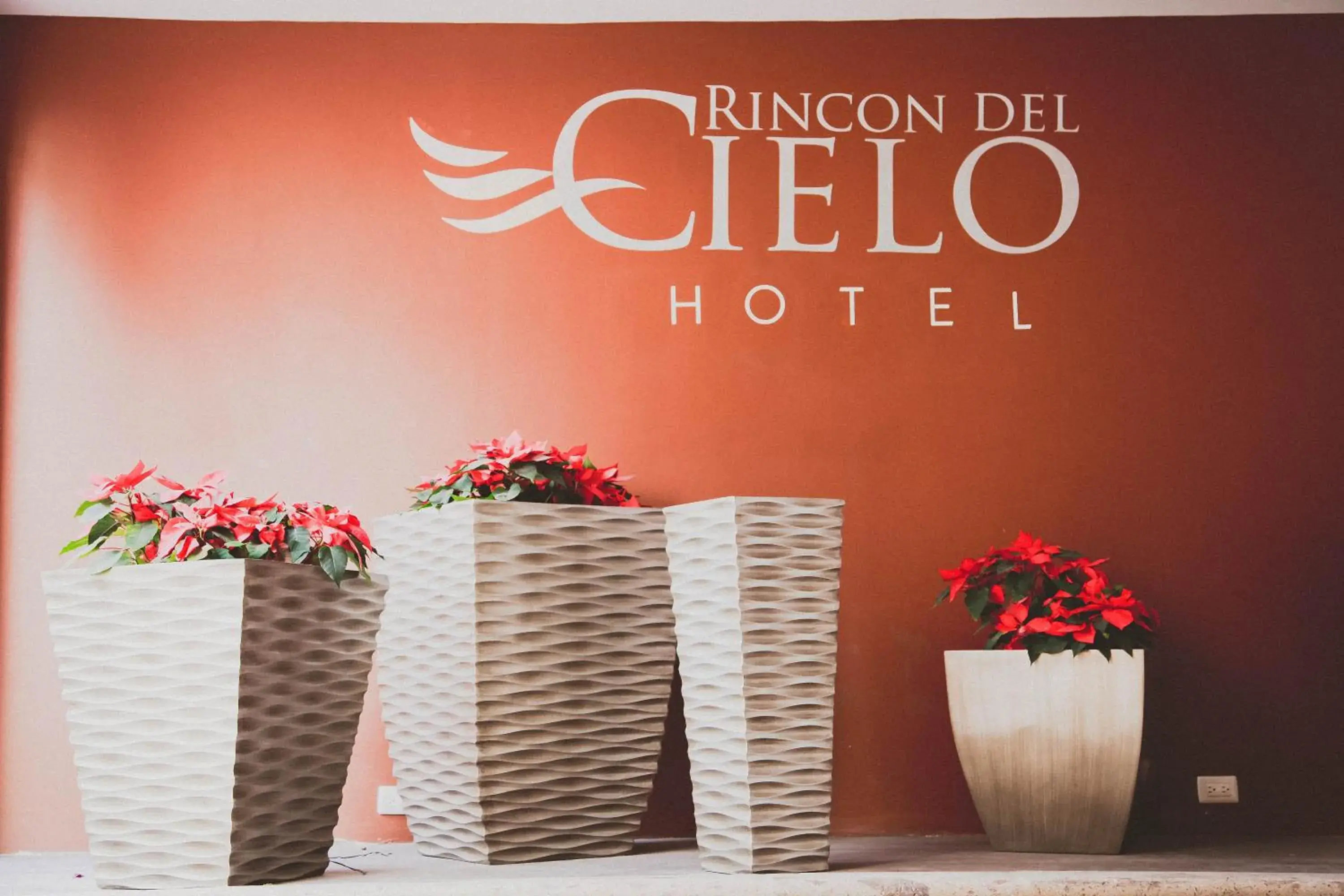 Property logo or sign in Hotel Rincon del Cielo