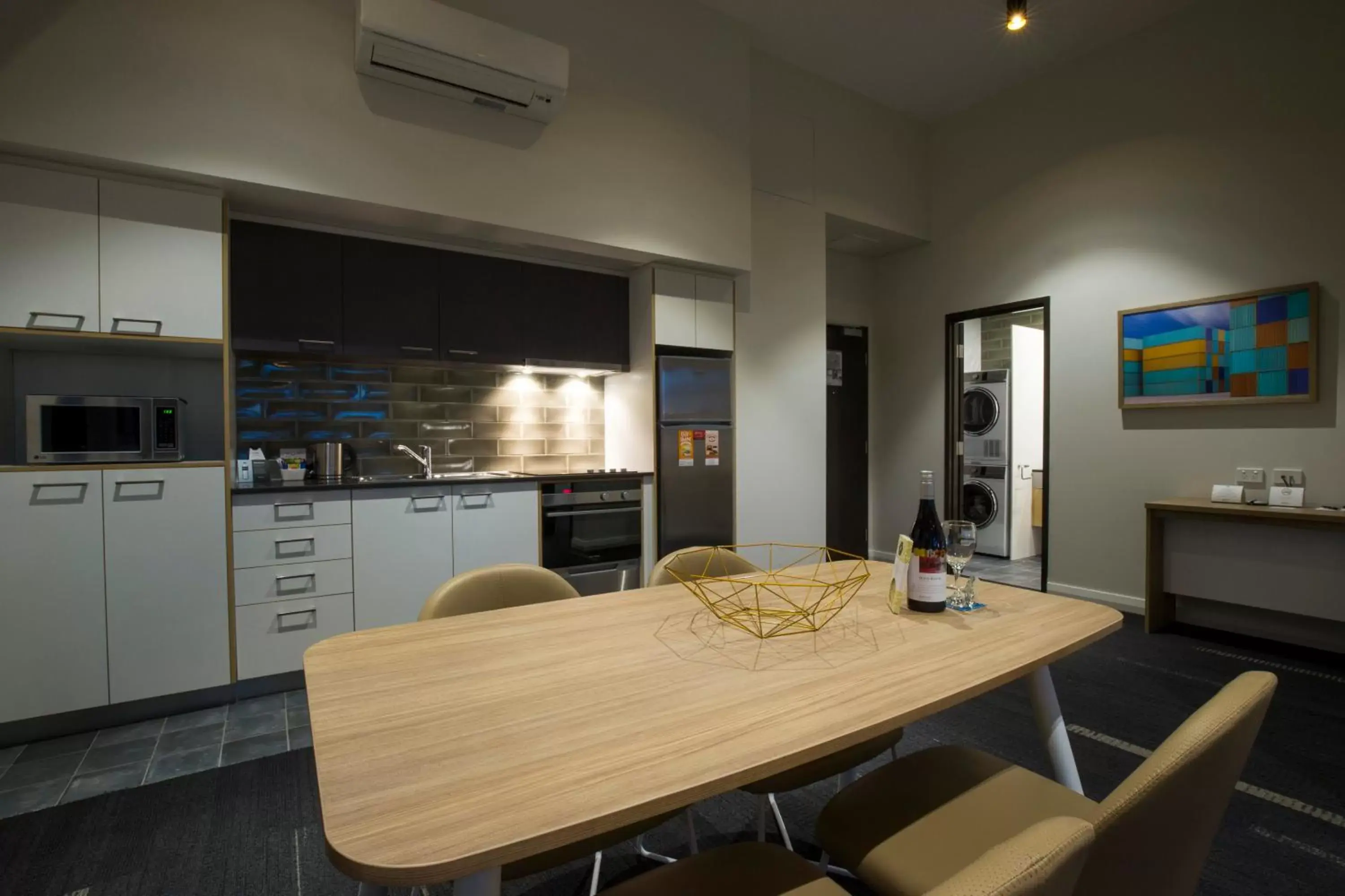 Kitchen or kitchenette, Dining Area in Quest Fremantle