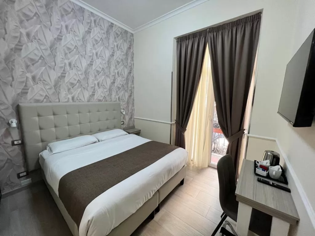 Bed in Hotel Le Petit