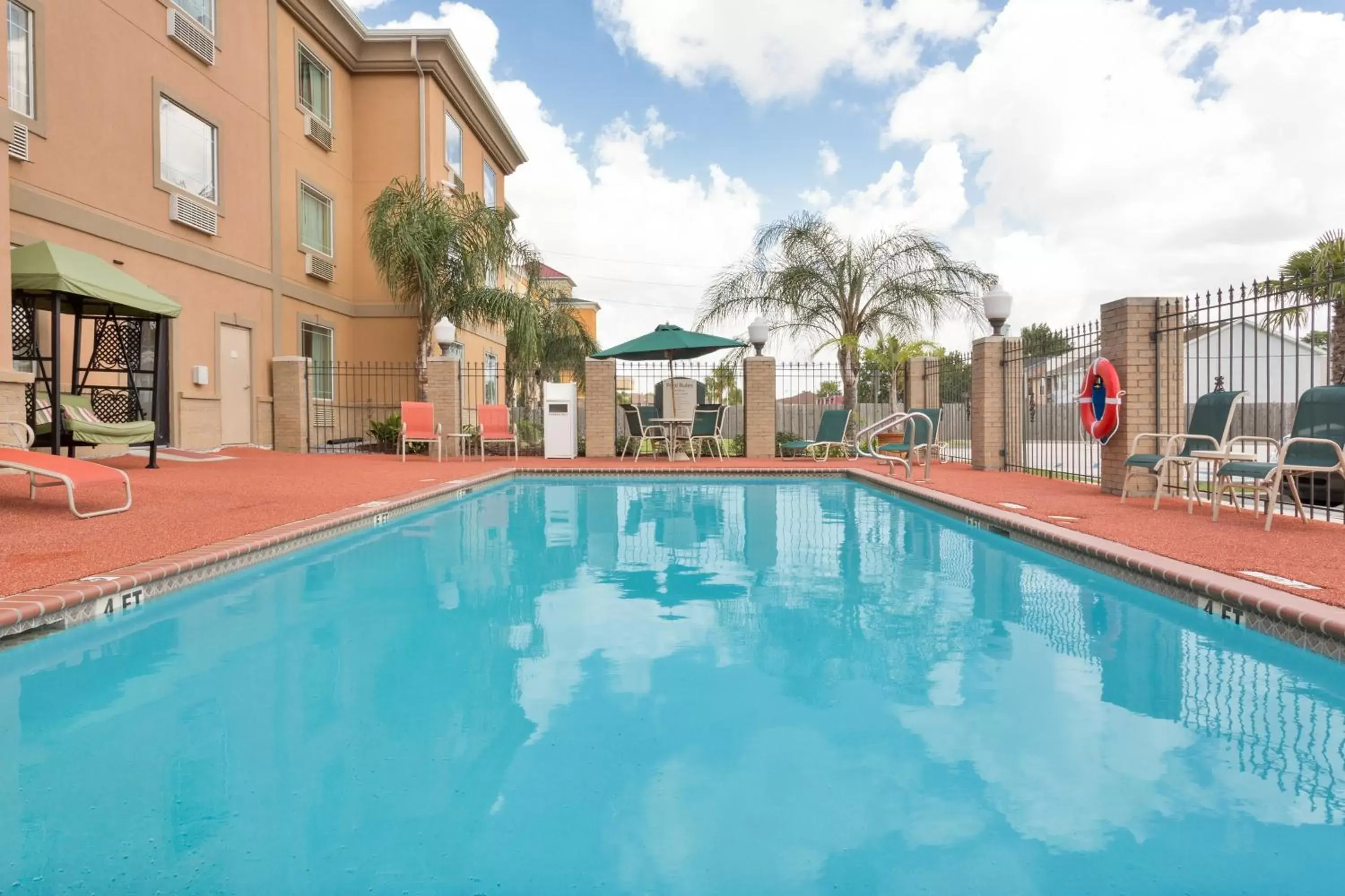 Swimming Pool in Holiday Inn Express Harvey-Marrero, an IHG Hotel