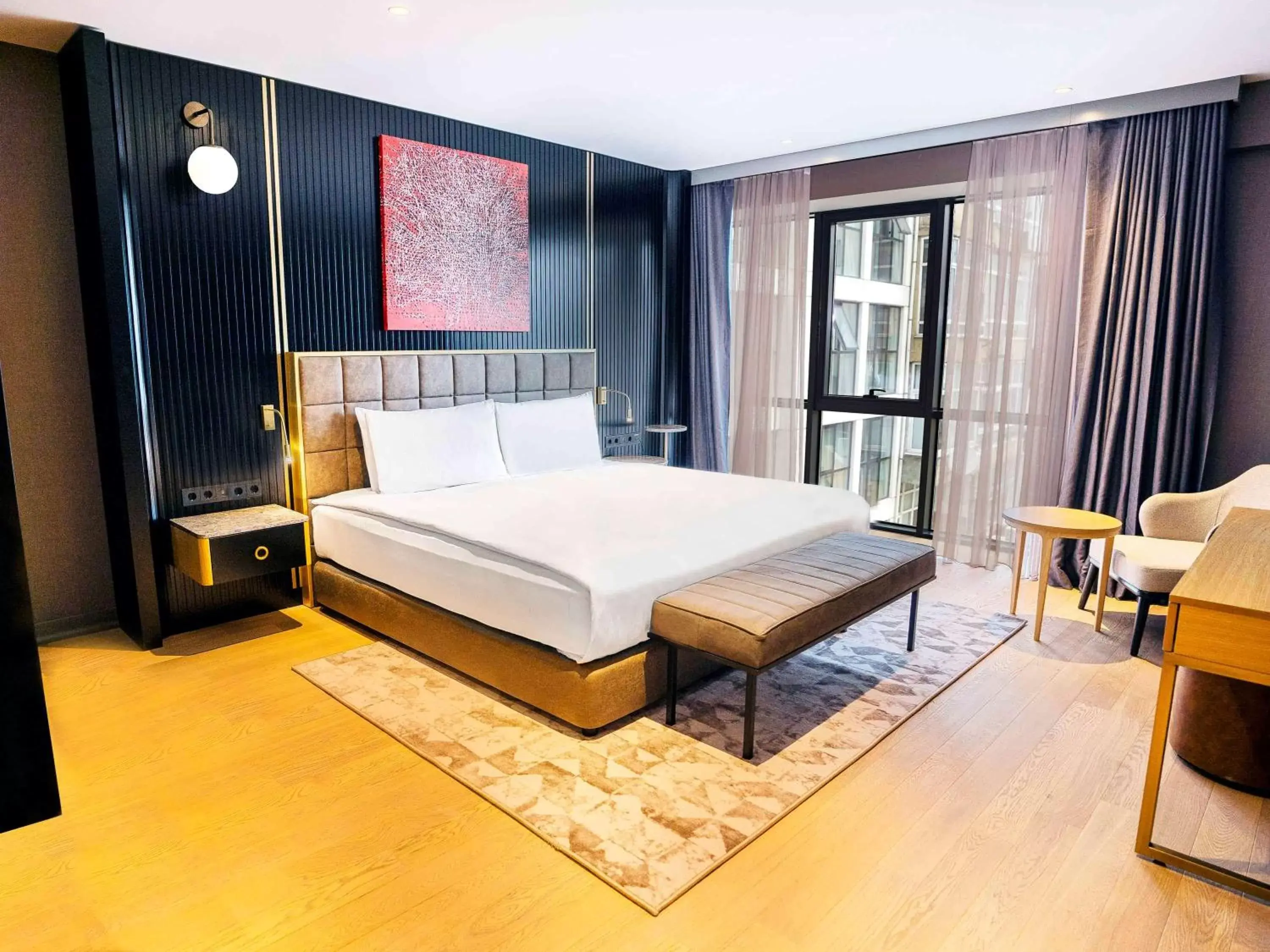 Photo of the whole room, Bed in Sofitel Istanbul Taksim