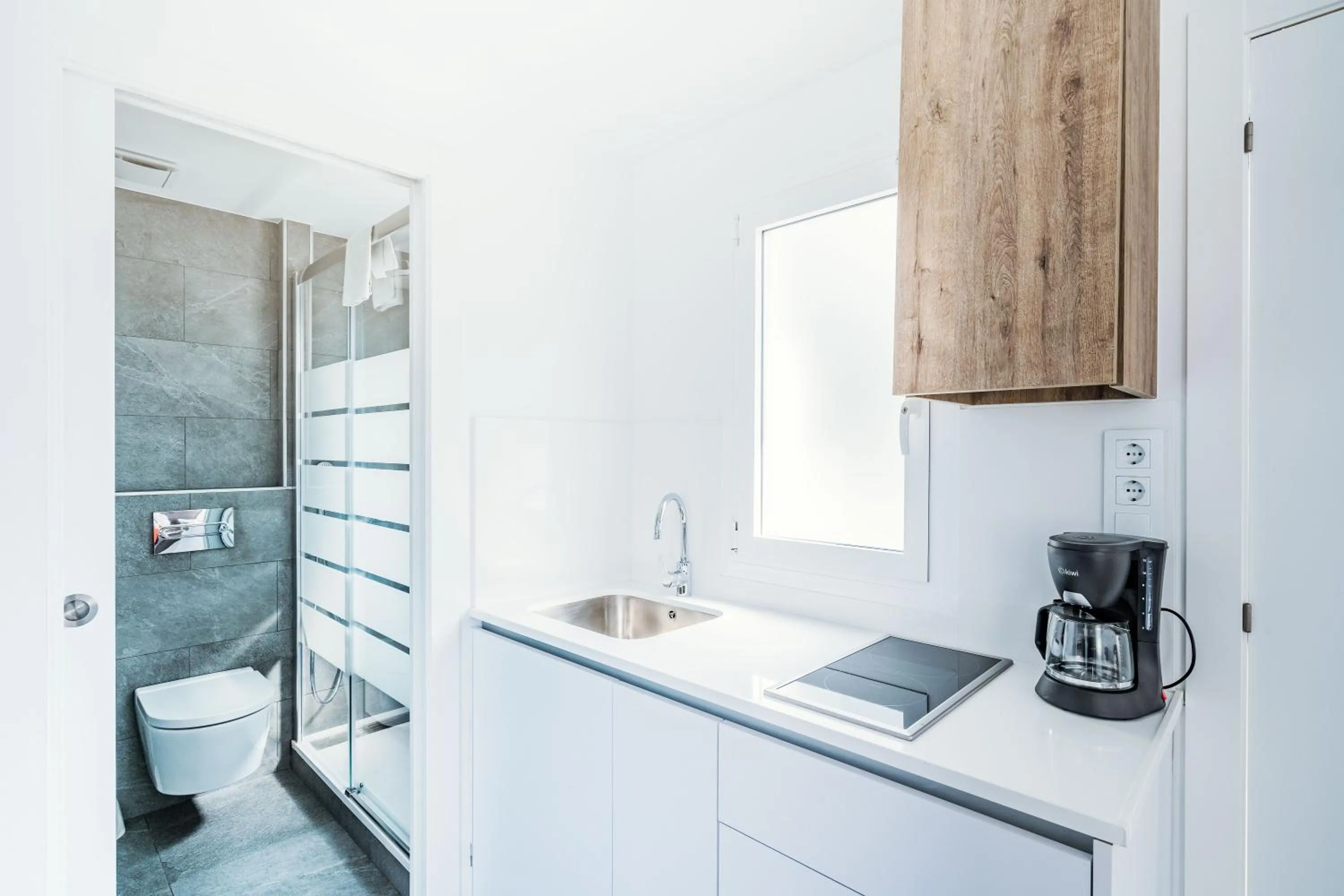 Kitchen or kitchenette in Apartamentos Sunway Apollo