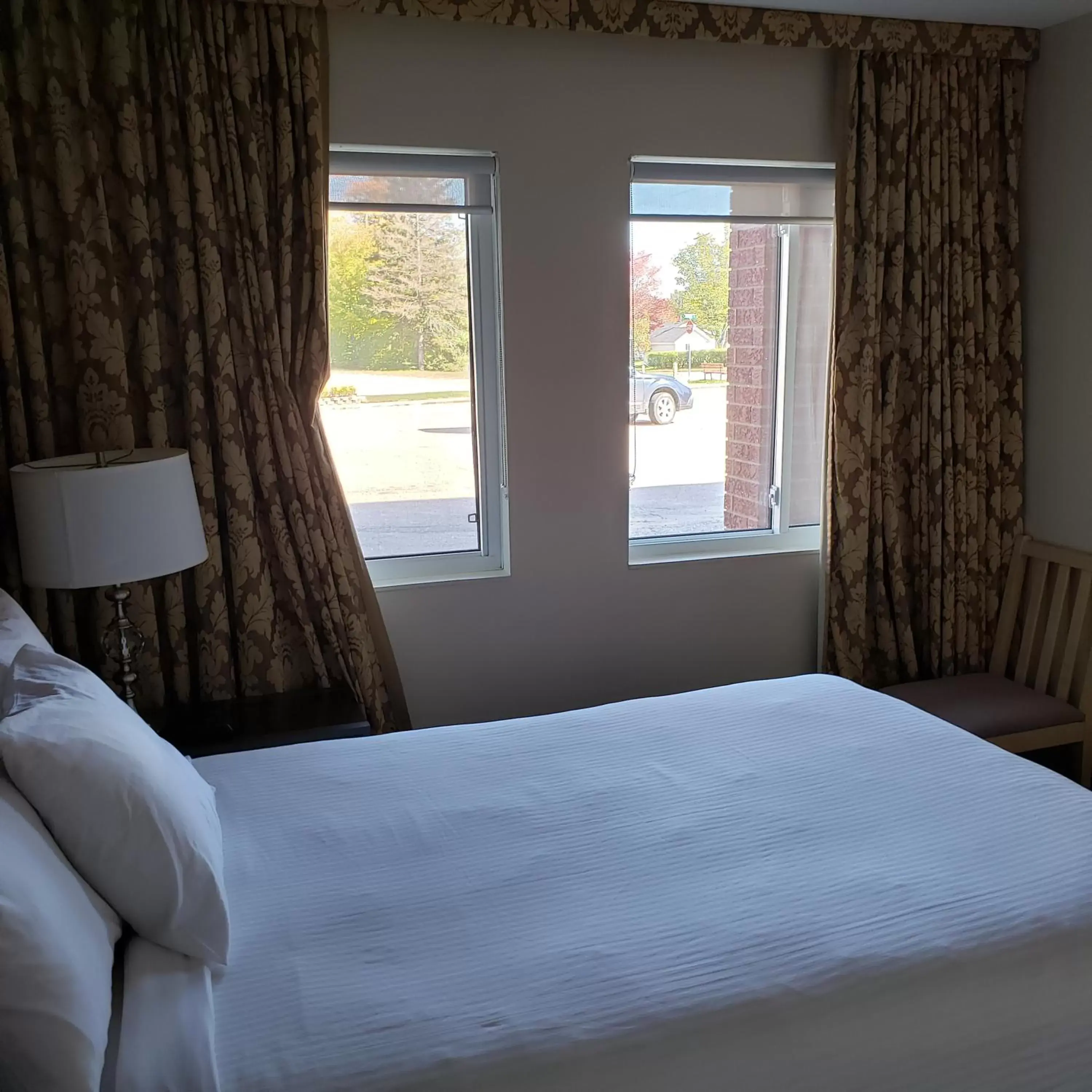 Bed in Shemron Suites Hotel
