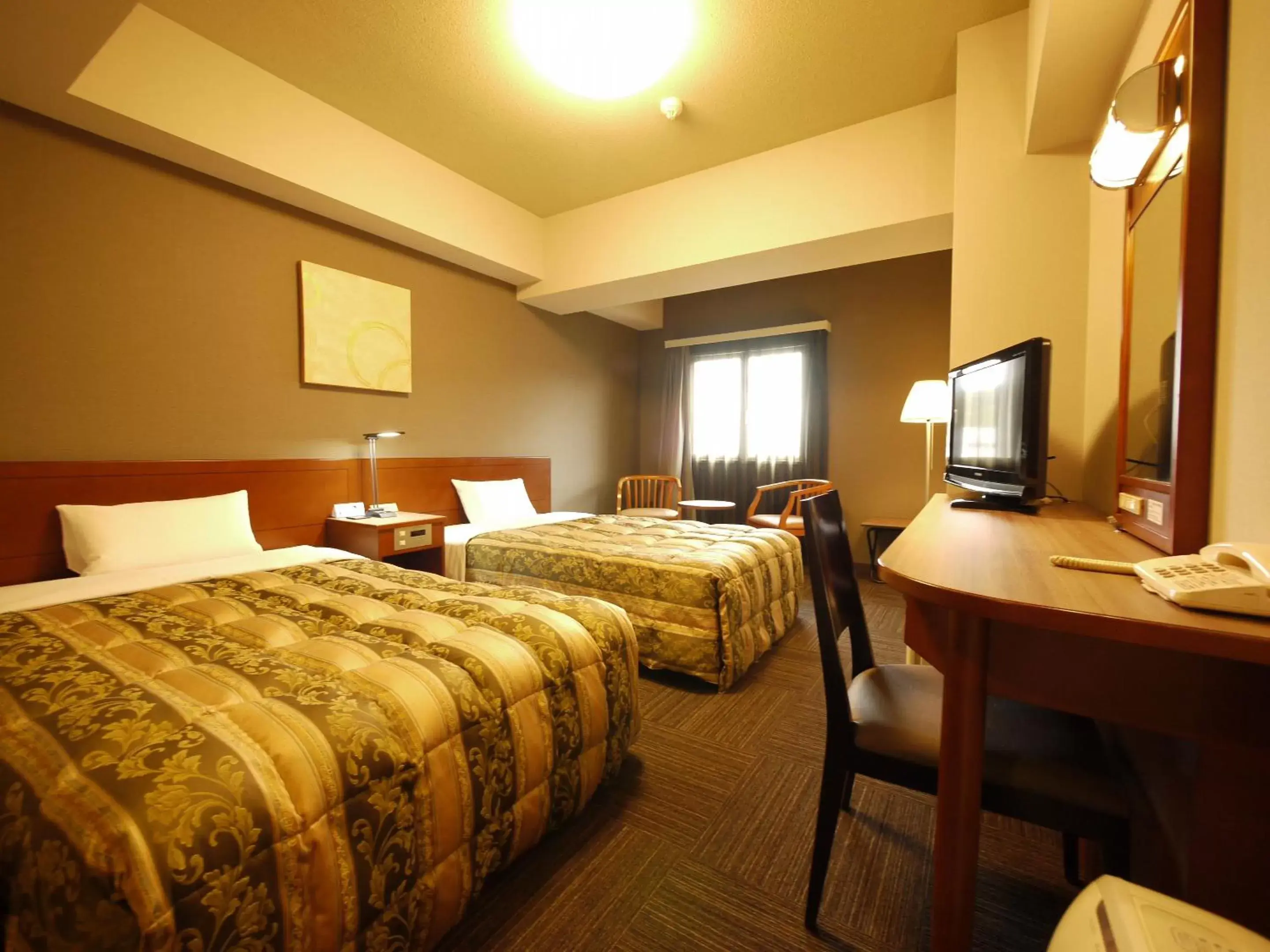 Photo of the whole room, Bed in Hotel Route-Inn Abashiri Ekimae