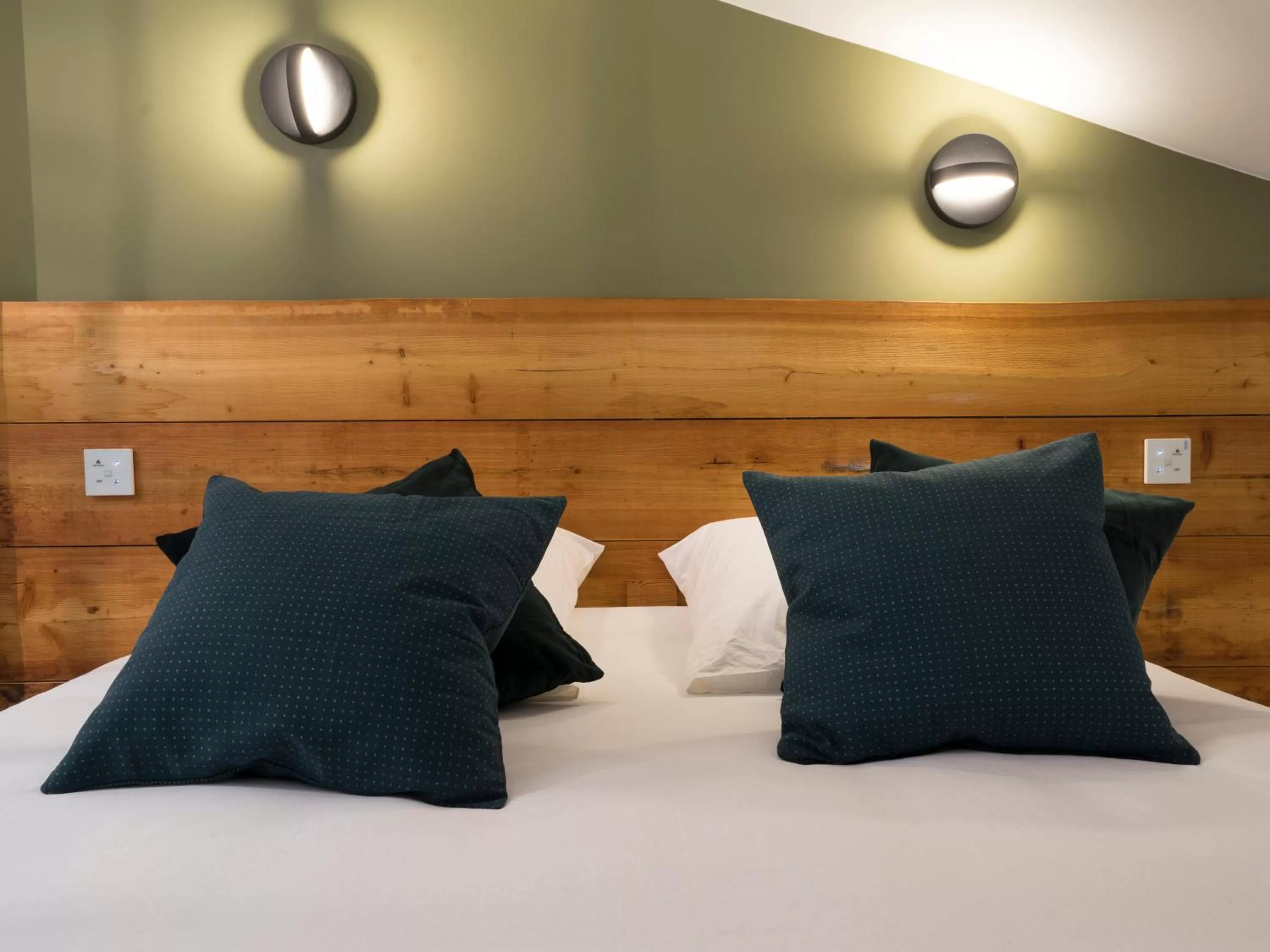 Bed in MiHotel Comte