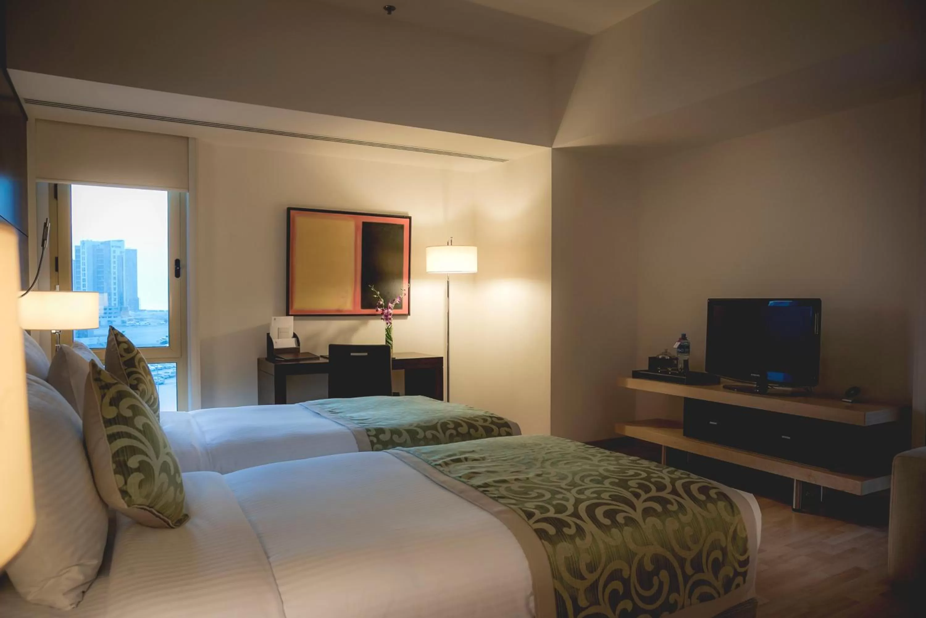 Communal lounge/ TV room, Bed in Asdal Gulf Inn Boutique Hotel- SEEF