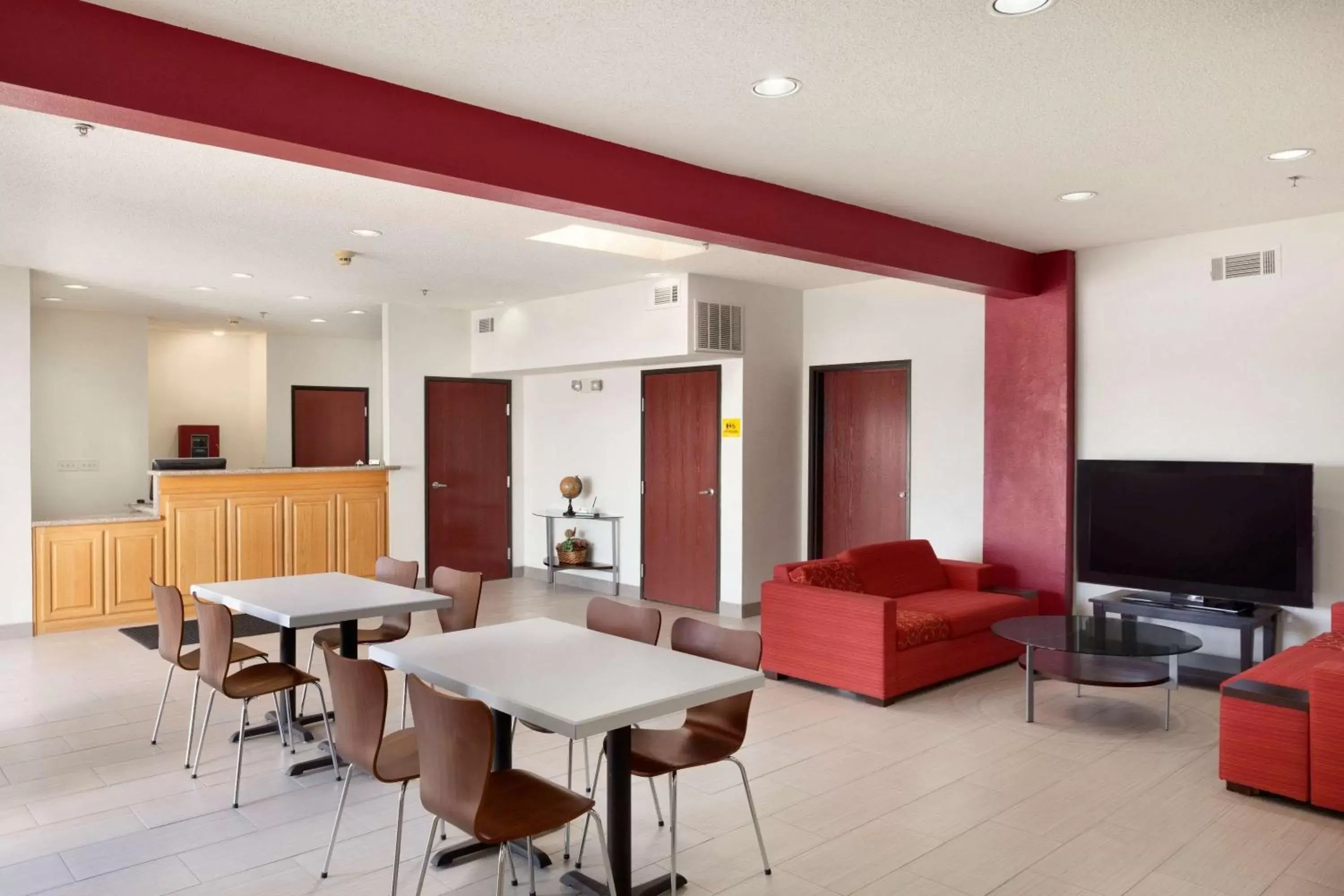 Lobby or reception in Super 8 by Wyndham Garland Rowlett East Dallas Area Lobby or reception in Super 8 by Wyndham Garland Rowlett East Dallas Area