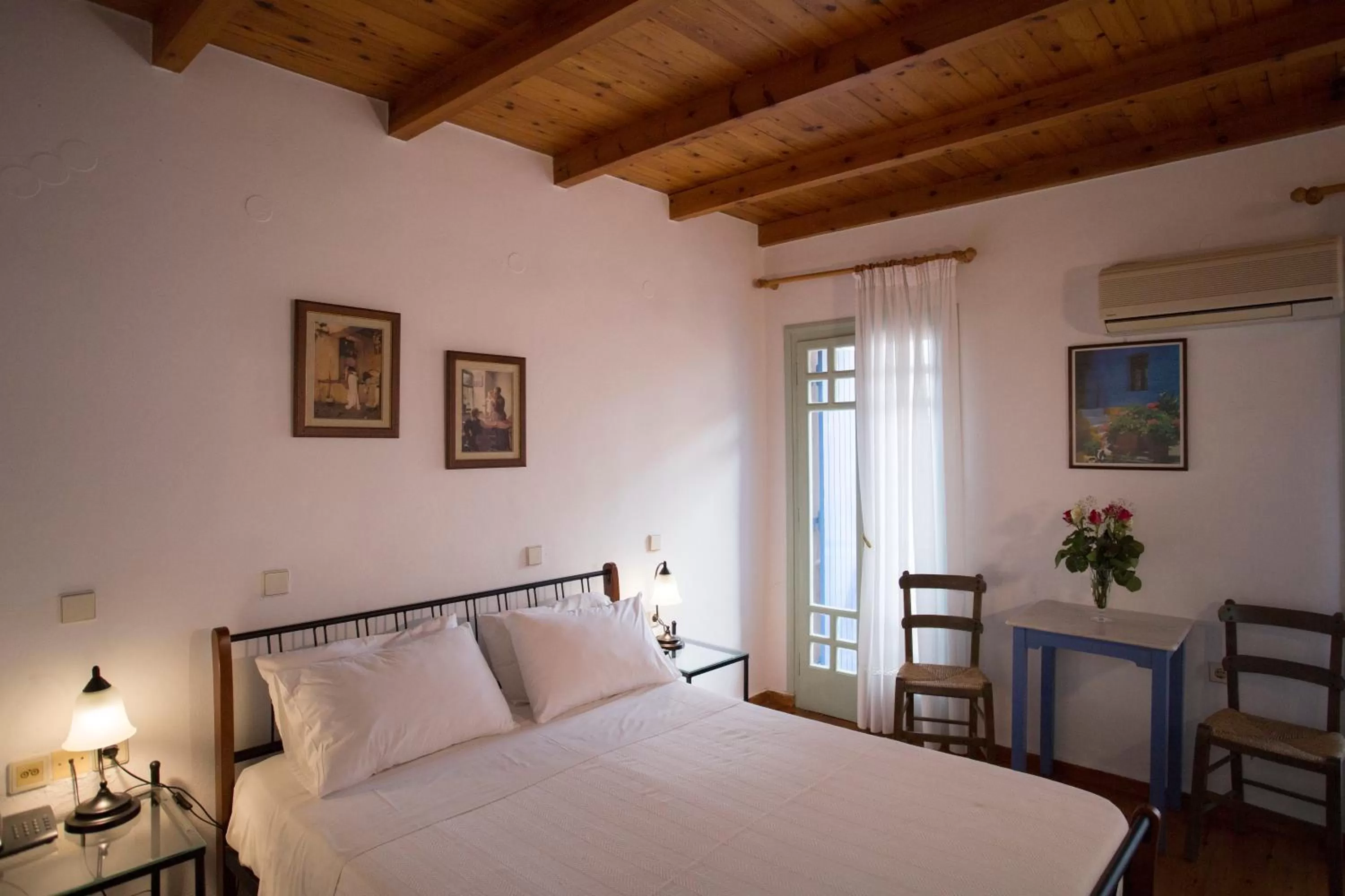 Bed in Nostos Hotel