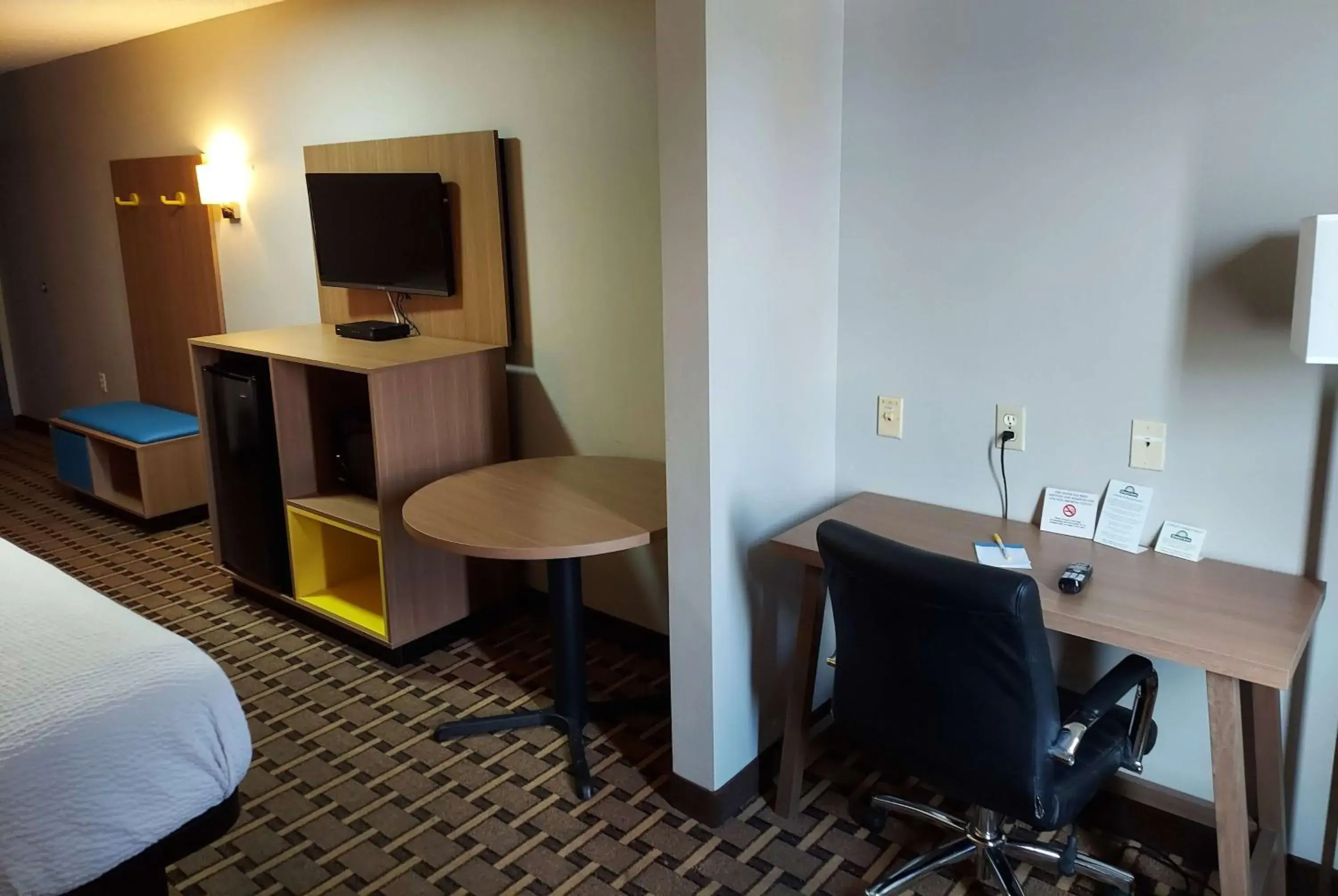 Photo of the whole room, TV/Entertainment Center in Days Inn & Suites by Wyndham Huntsville