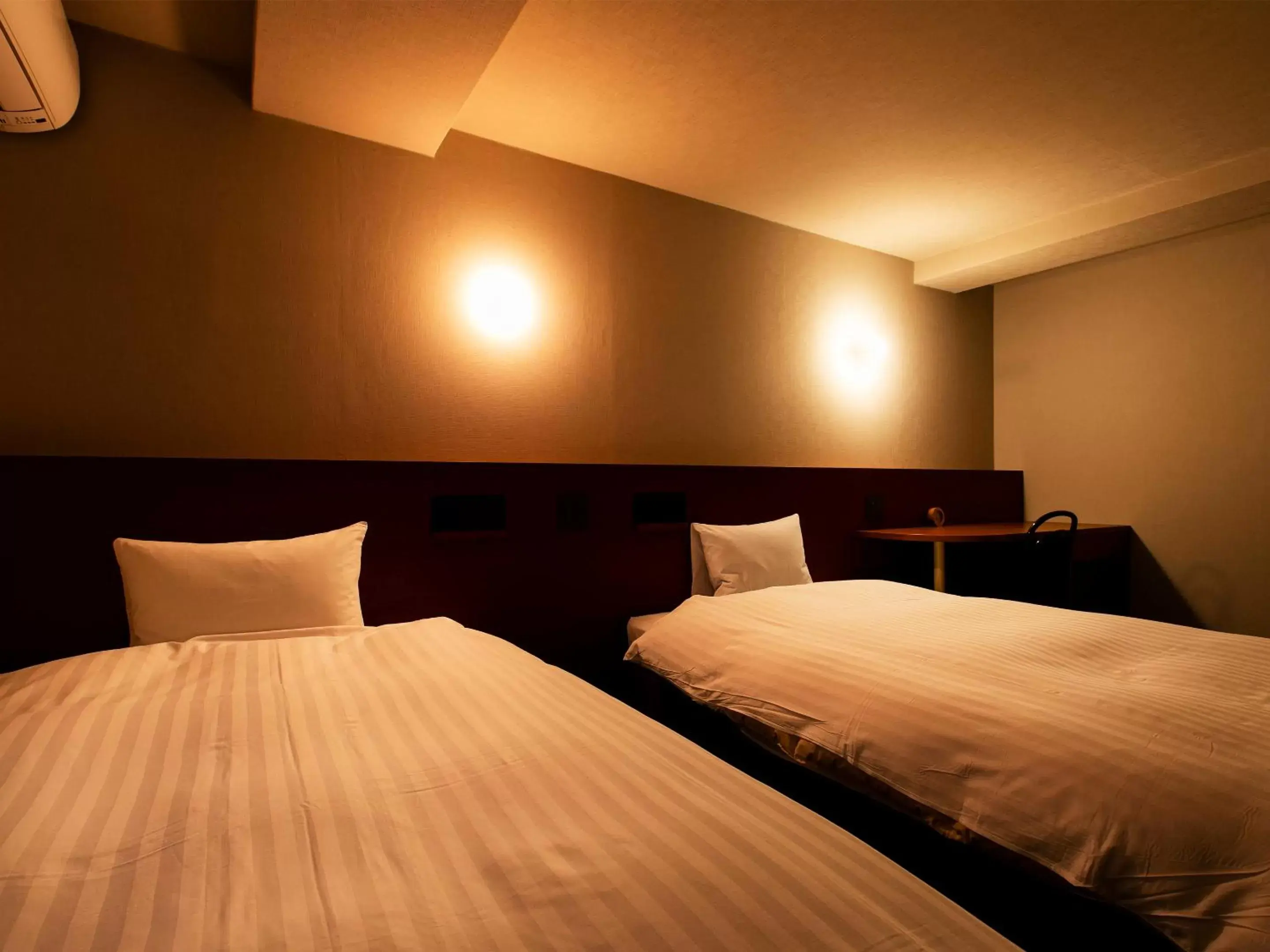 Photo of the whole room, Bed in Hotel New Nishino