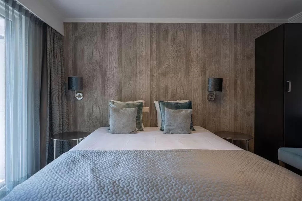 Bed in Boutique Hotel Slenaker Vallei - Buitengewoongenieten