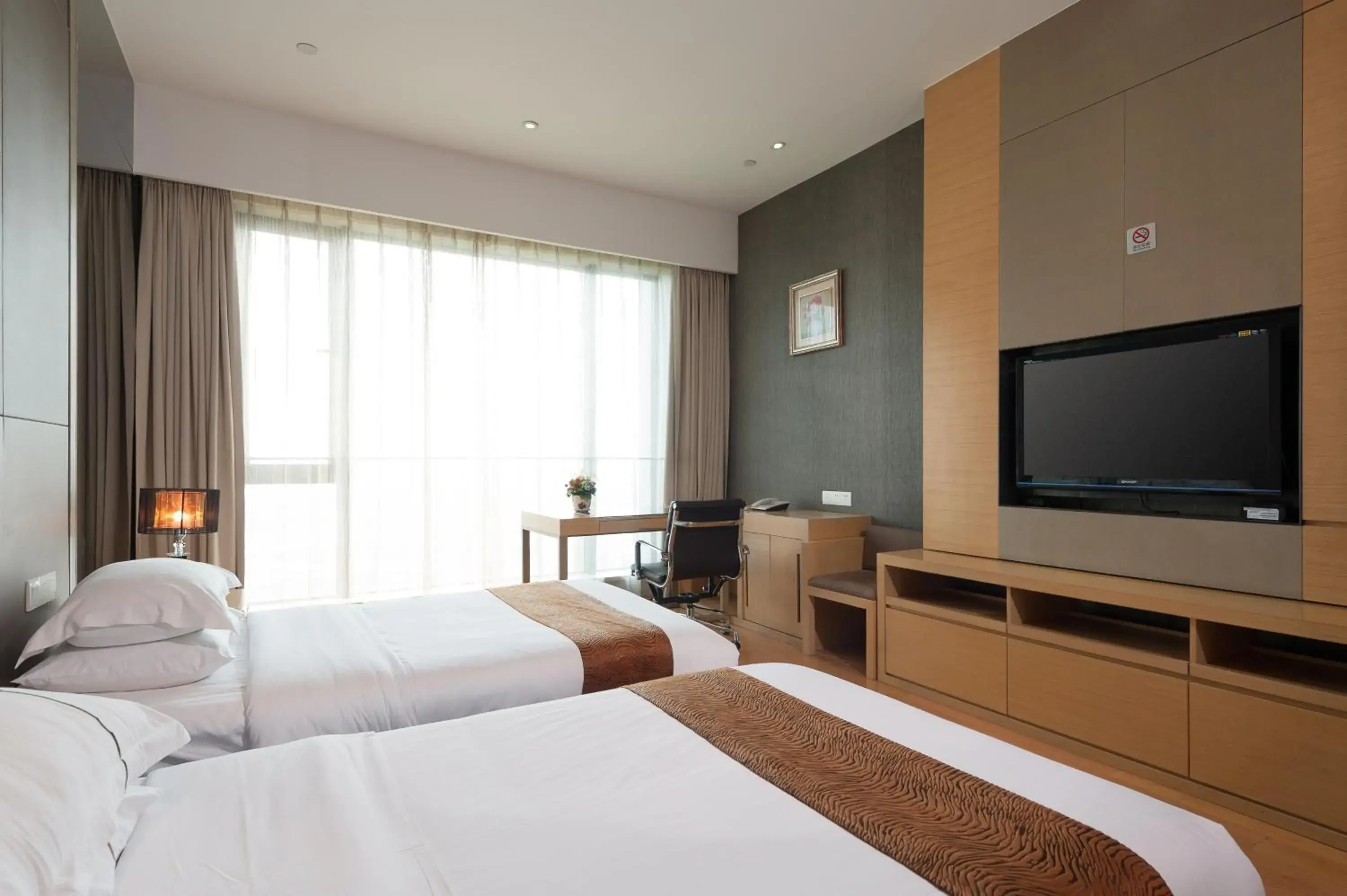 Bed in Yicheng Pazhou Poly World Trade Centre Apartment