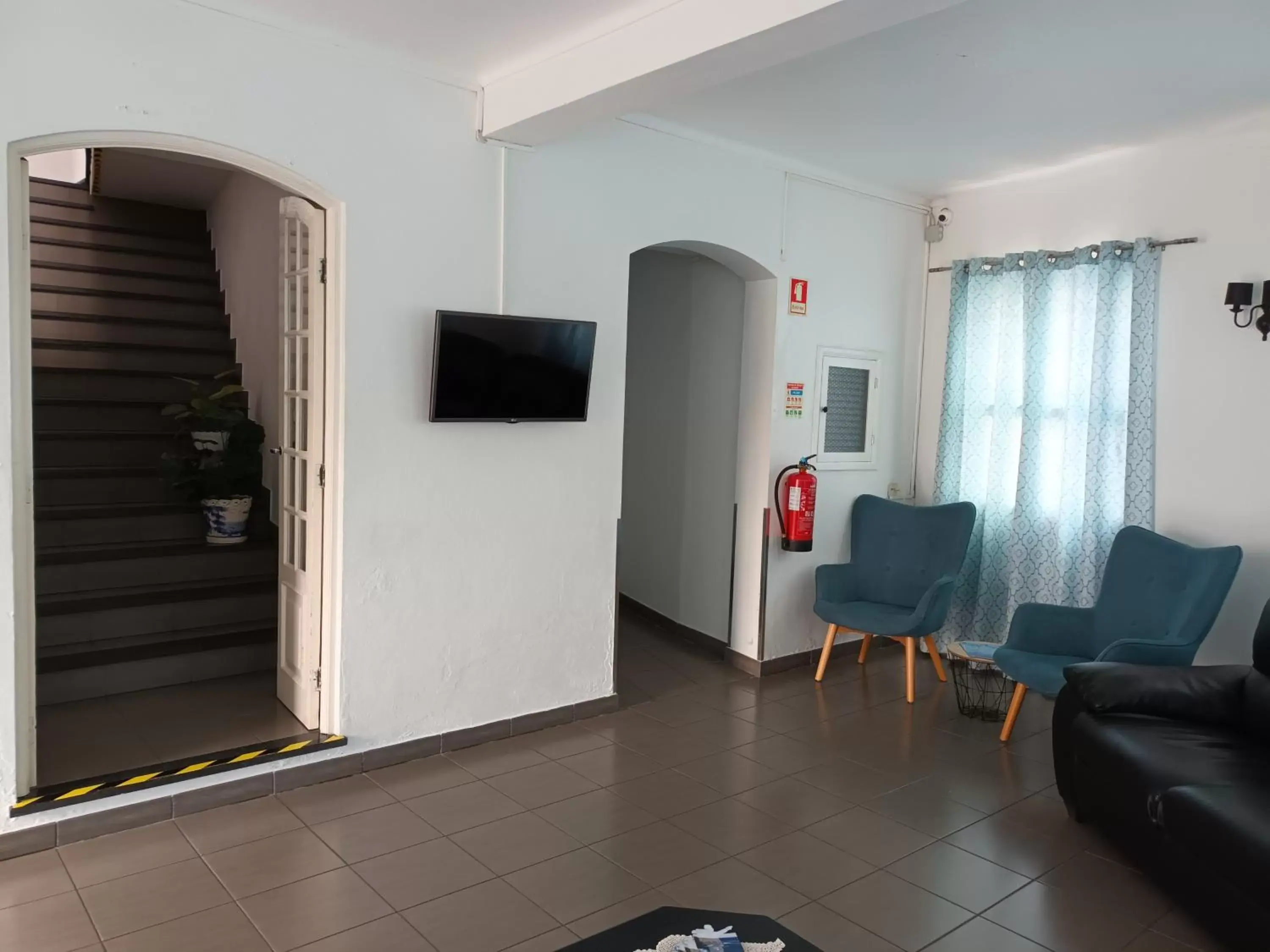 Communal lounge/ TV room, Seating Area in Hotel Branco I