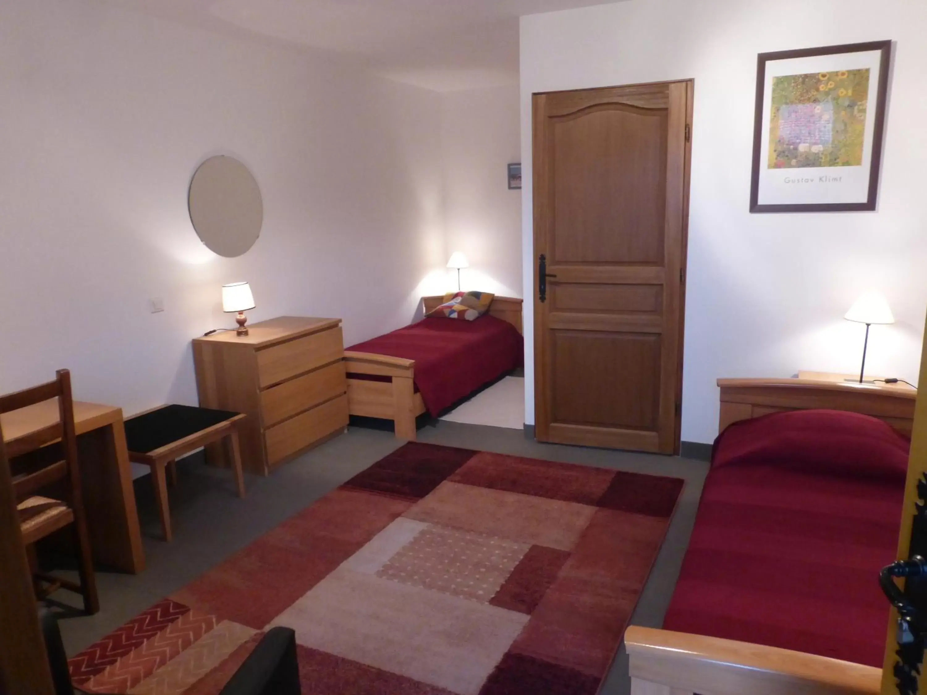 Bed, Seating Area in Hôtel Les Charmilles de Mormal