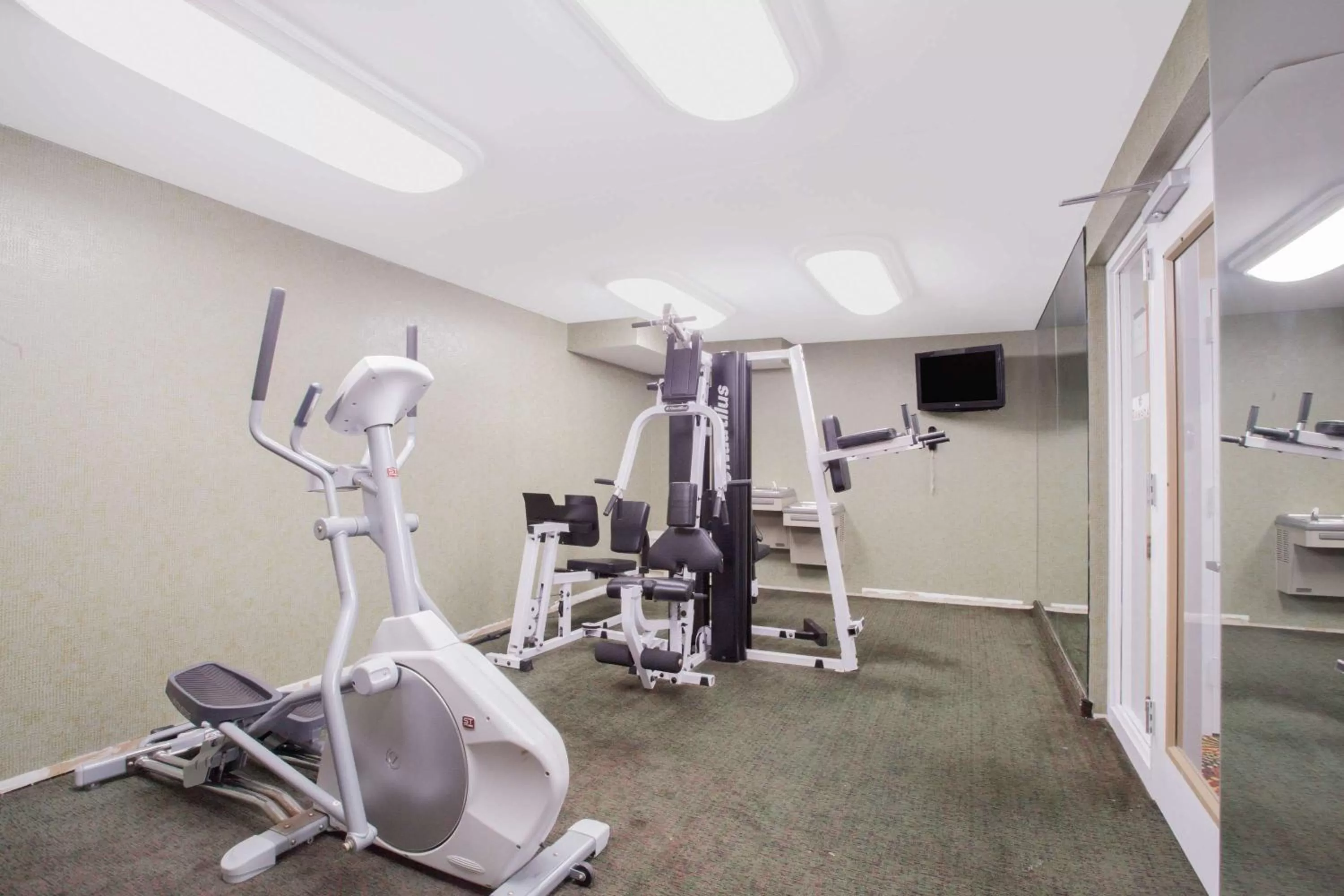 Fitness centre/facilities in Ramada by Wyndham Edgewood Hotel & Conference Center