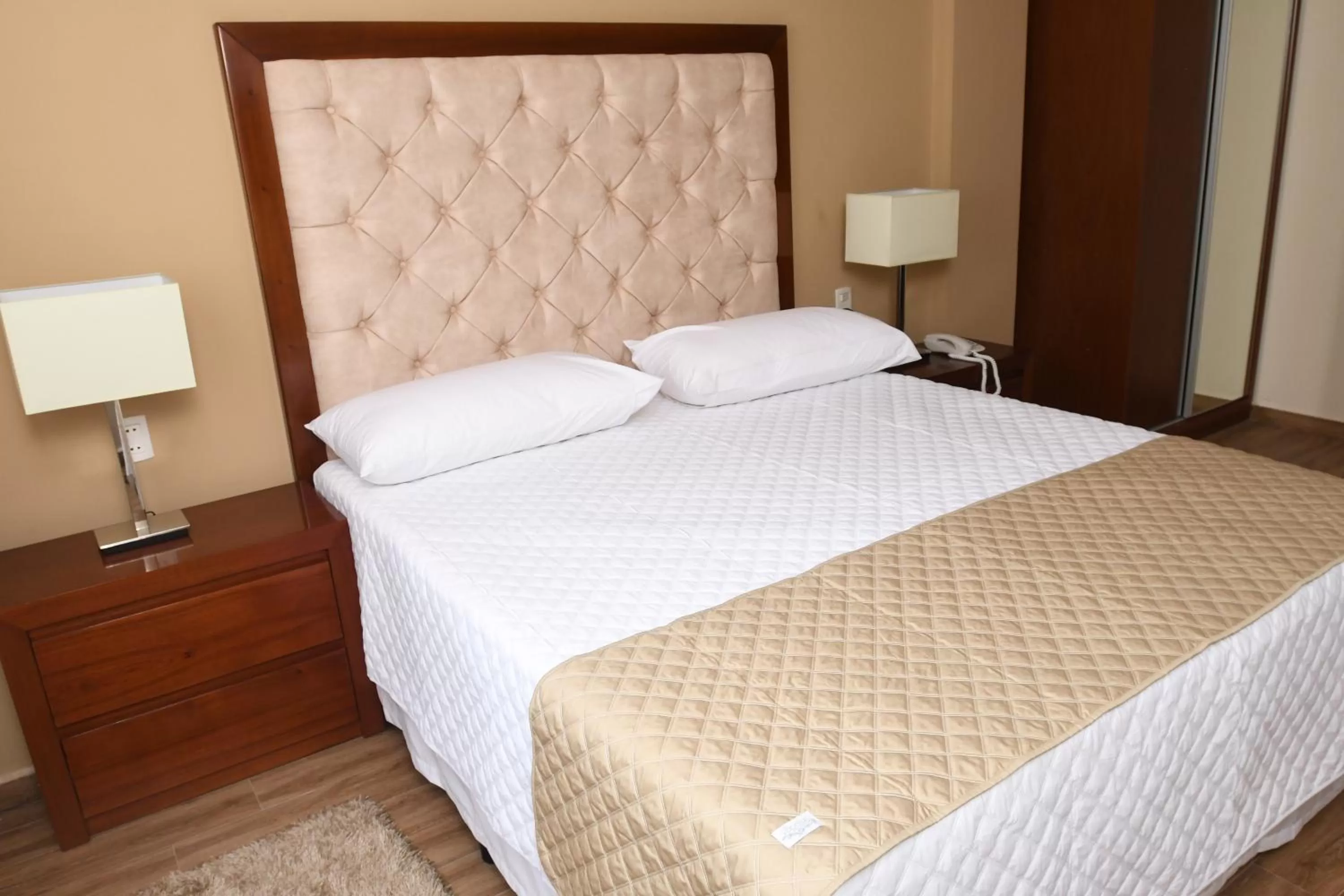 Bed in Taos Apart Hotel