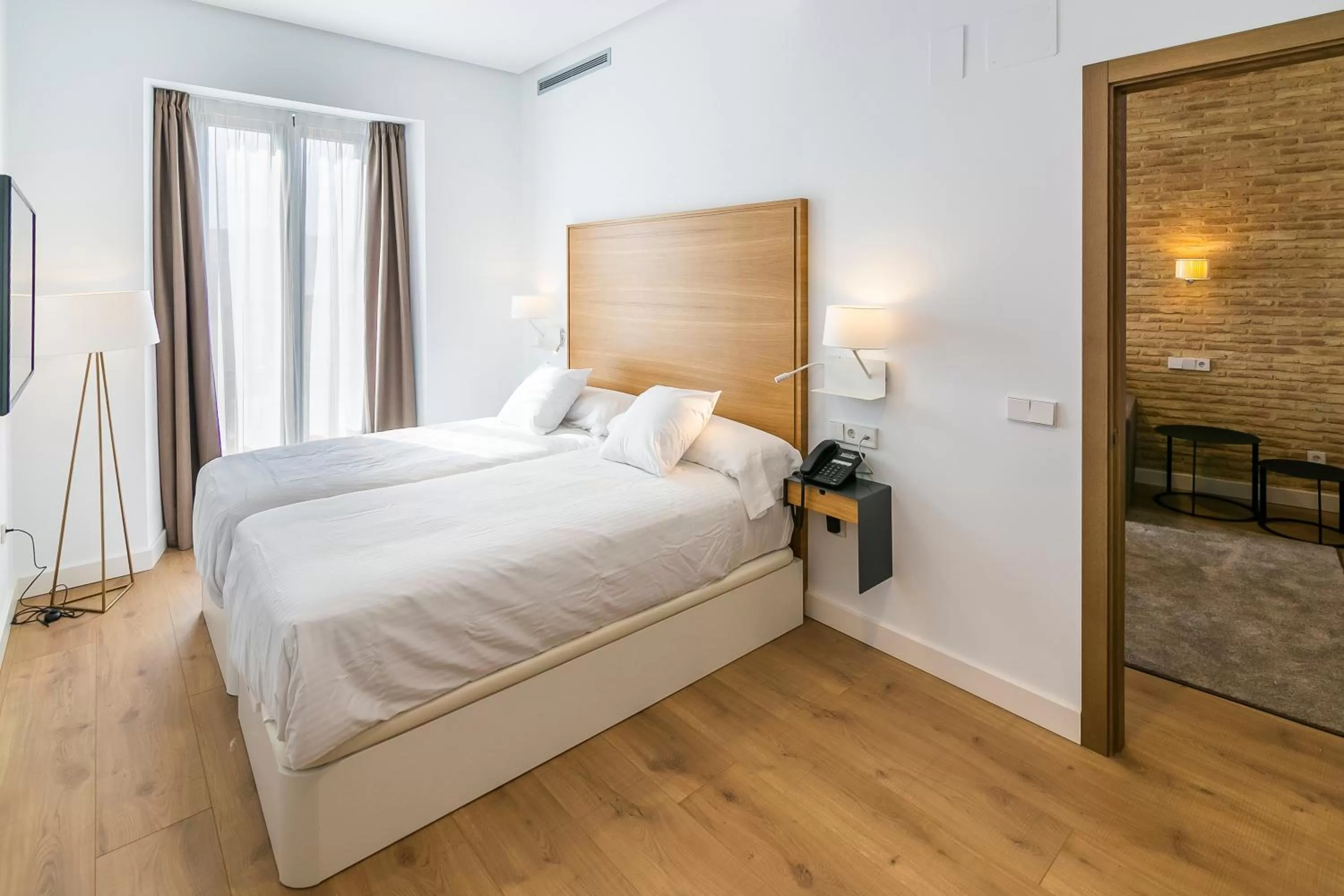 Bed in Aquitania Home Suites