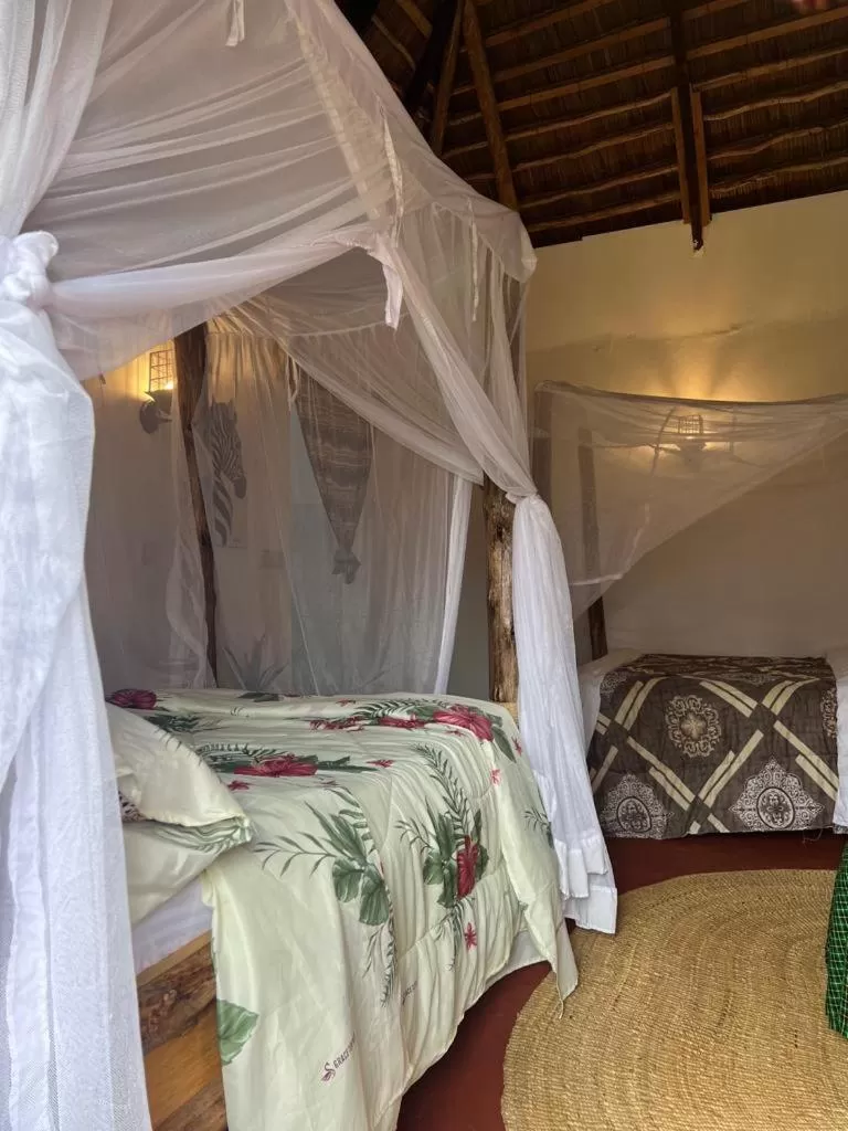 Bed in Charming Eco-Homestay near Kilimanjaro International Airport