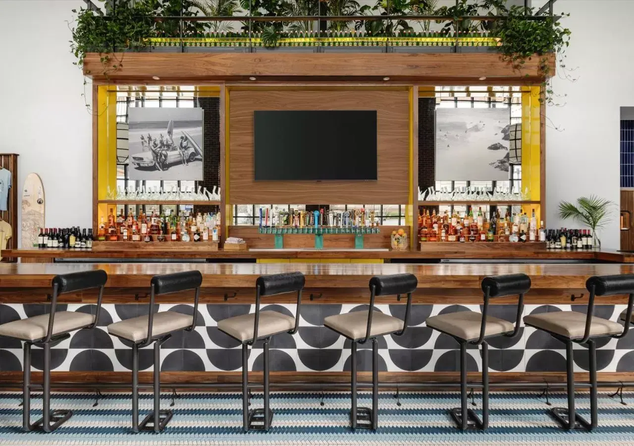 Lounge or bar in Hotel Tupelo, a Wyndham Hotel Lounge or bar in Hotel Tupelo, a Wyndham Hotel