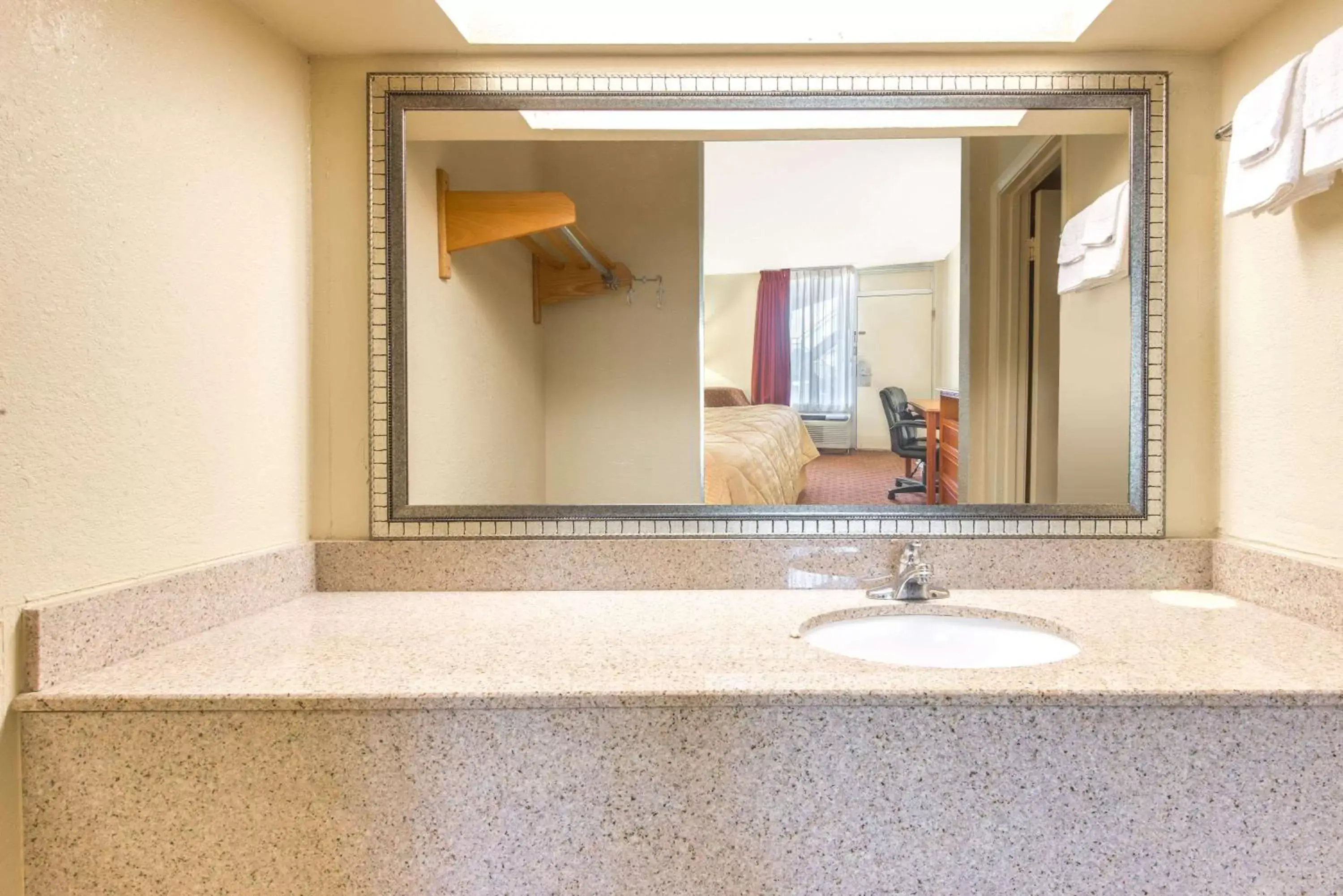 Bathroom in Days Inn by Wyndham Shorter