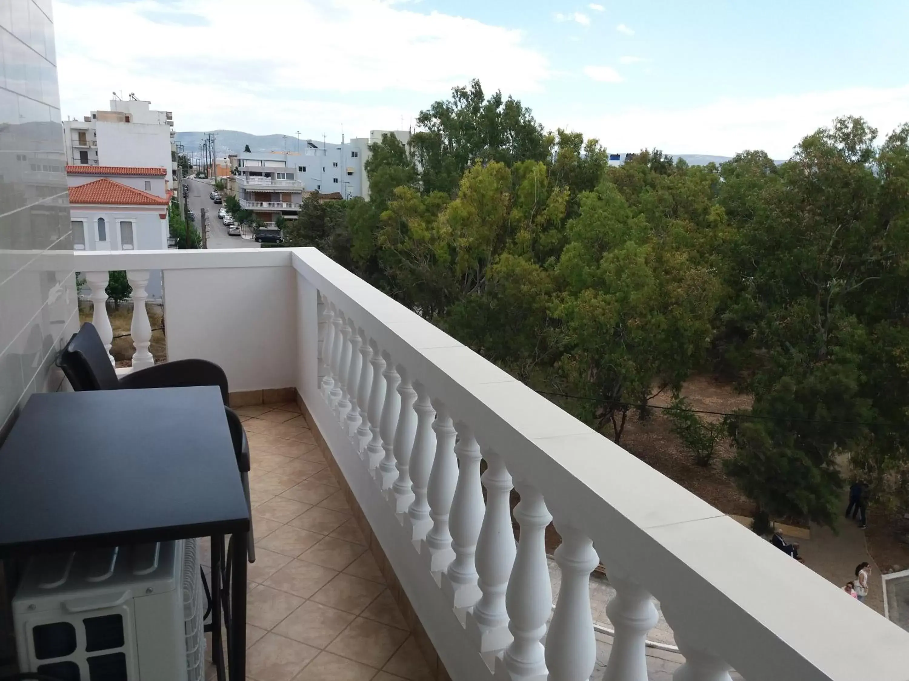 Property building, Balcony/Terrace in Nikolakakis Rooms Lavrio