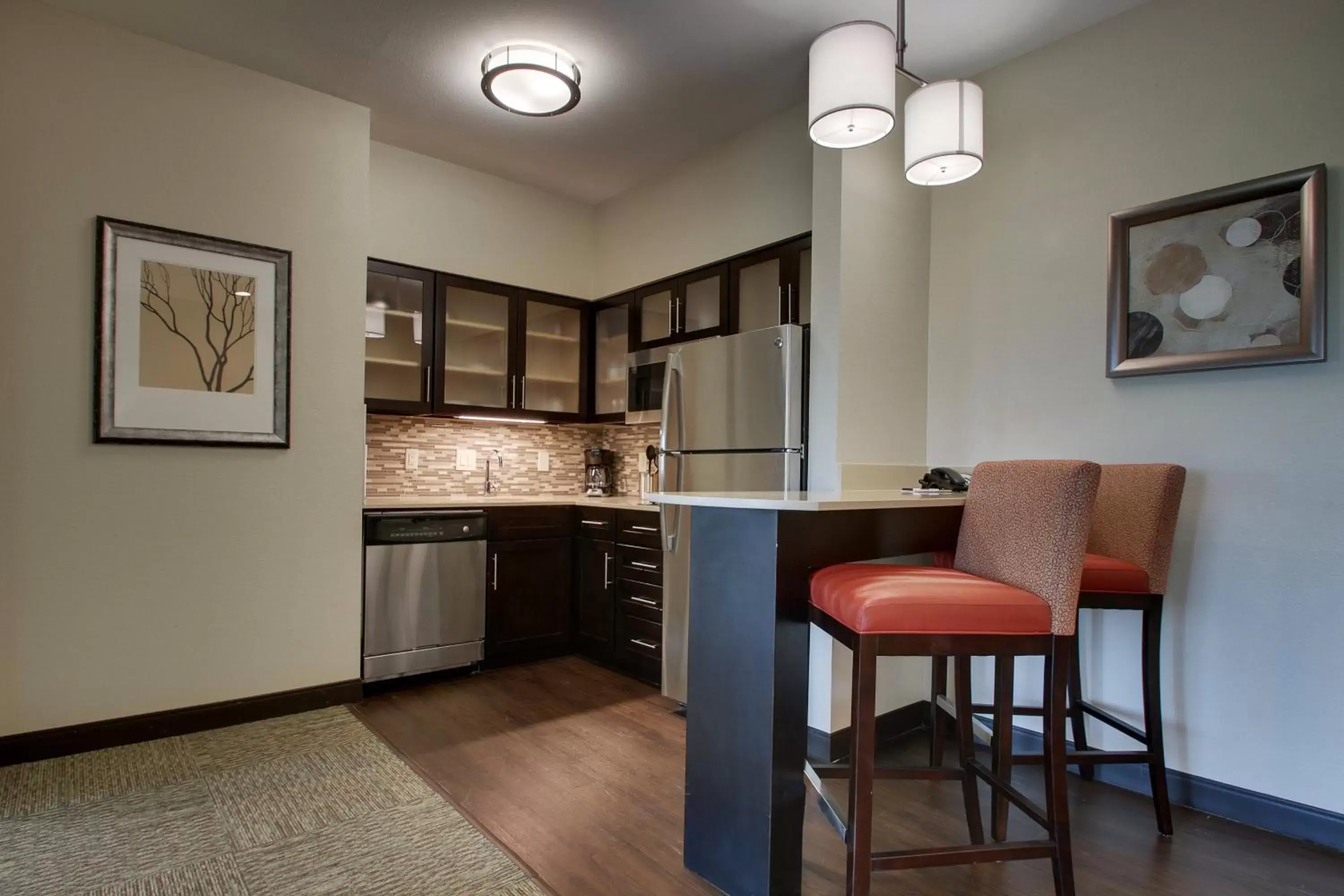 Photo of the whole room, Kitchen/Kitchenette in Staybridge Suites Plano - The Colony, an IHG Hotel