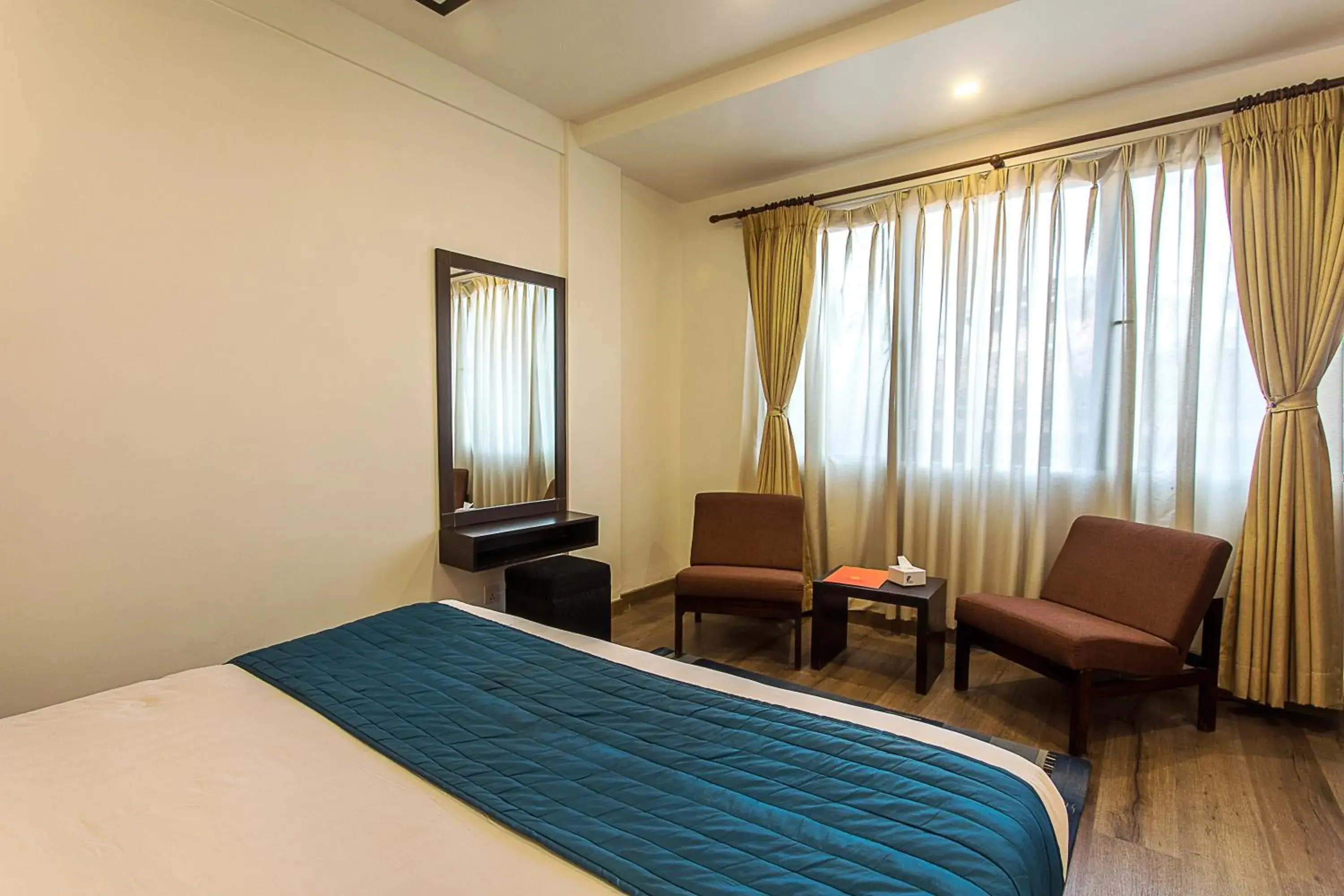 Bed in Gaju Suite Hotel