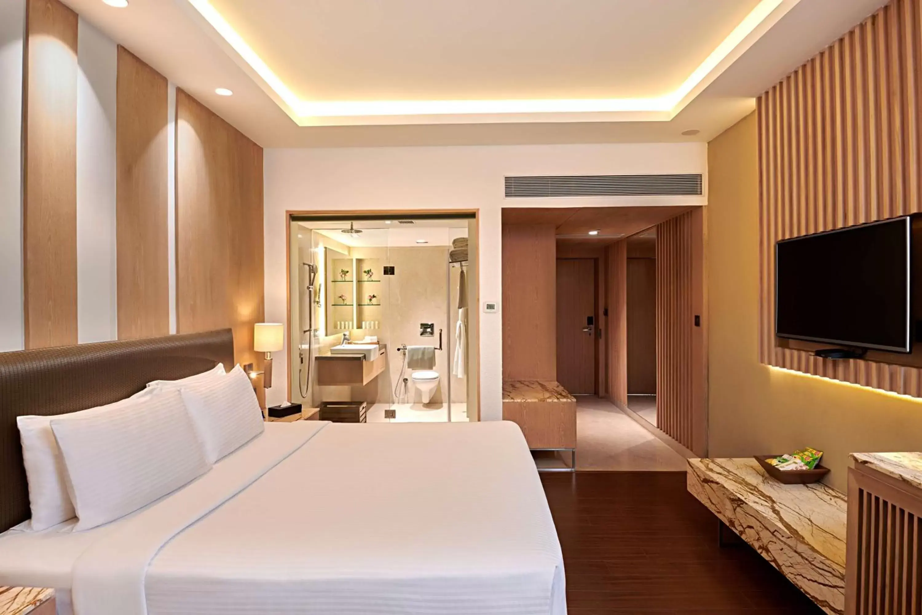 Photo of the whole room, Bed in Radisson Blu Resort & Spa Alibaug