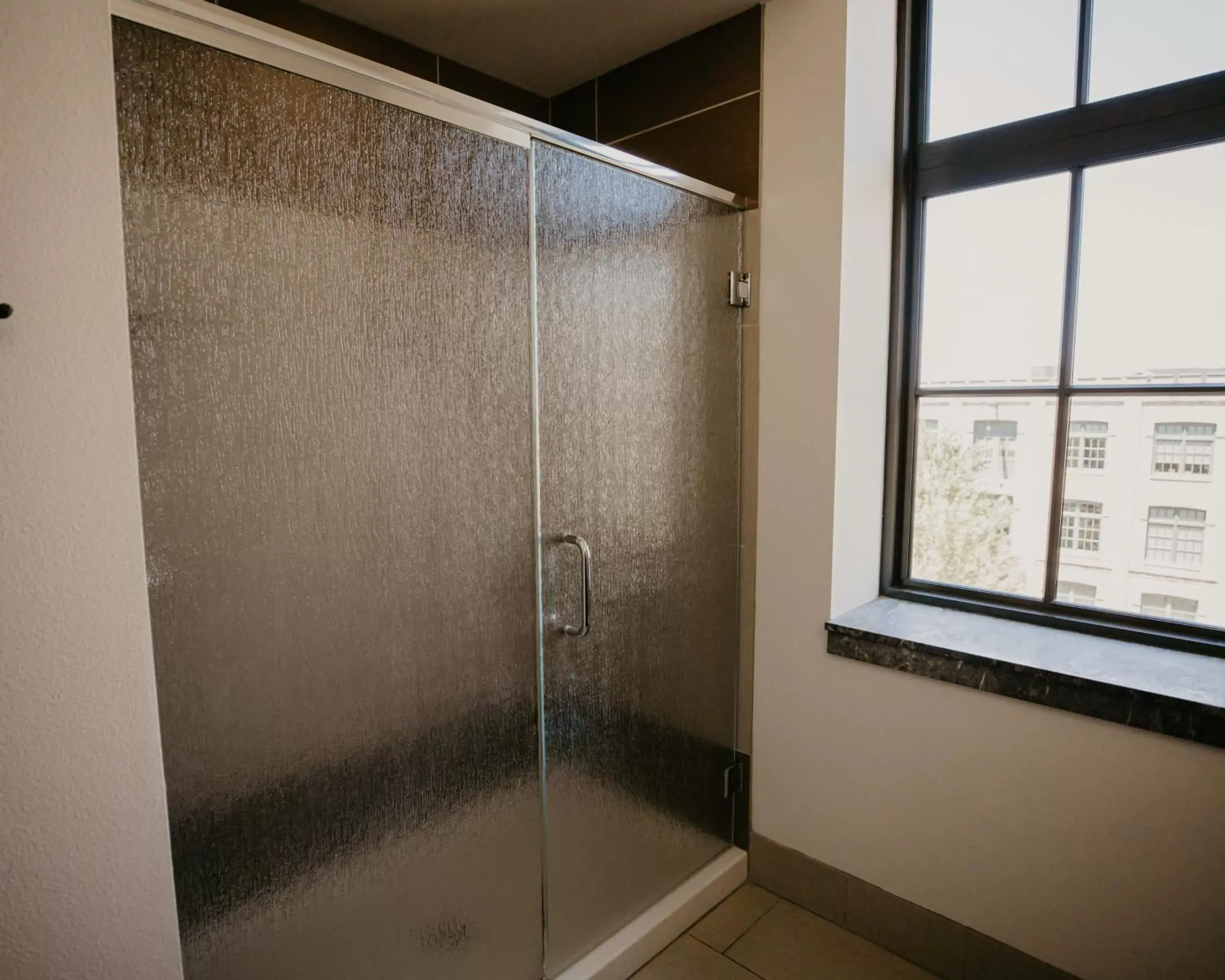 Guests, Bathroom in Brewhouse Inn and Suites