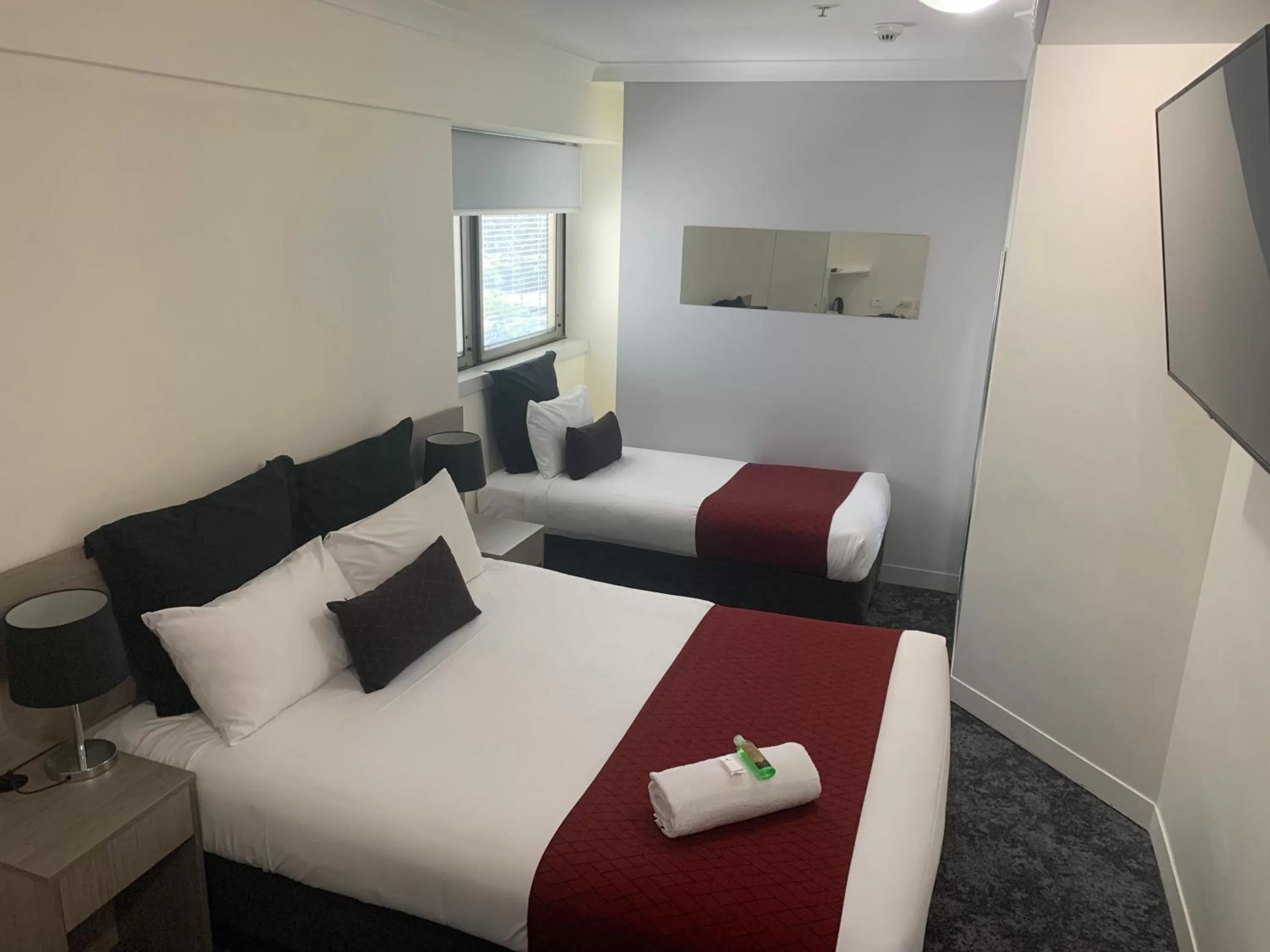 Bed in George Hotel Brisbane, Independent Collection by EVT