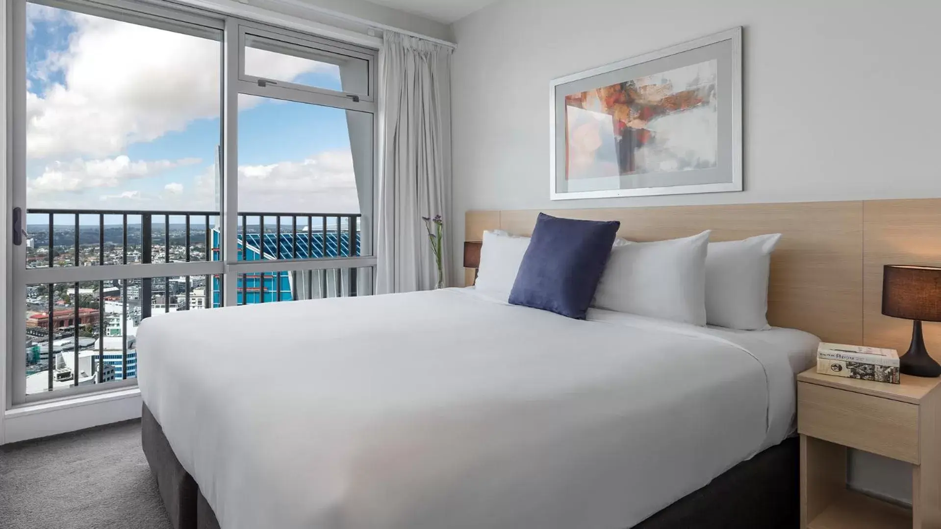 Bed in Auckland Harbour Suites