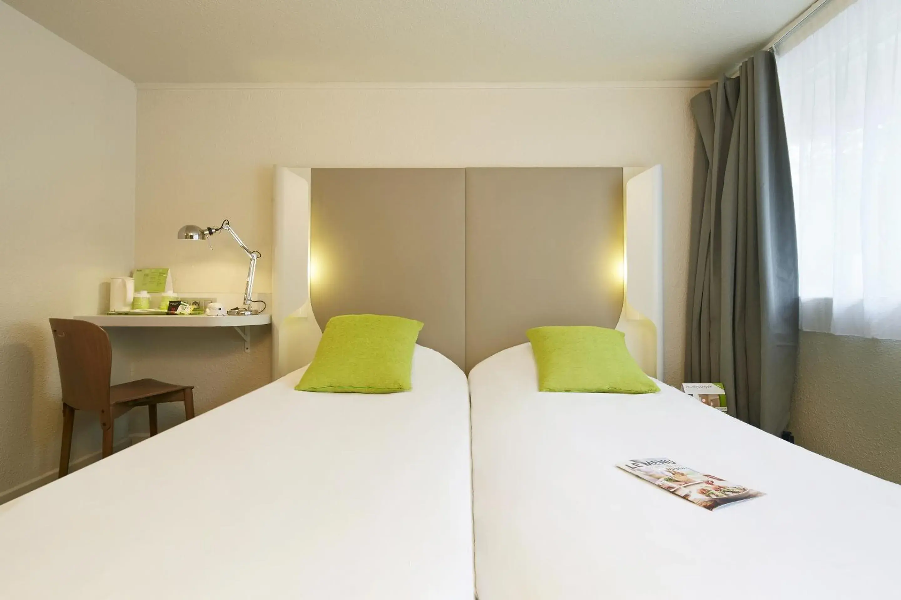 Photo of the whole room, Bed in Campanile Hotel Compiegne