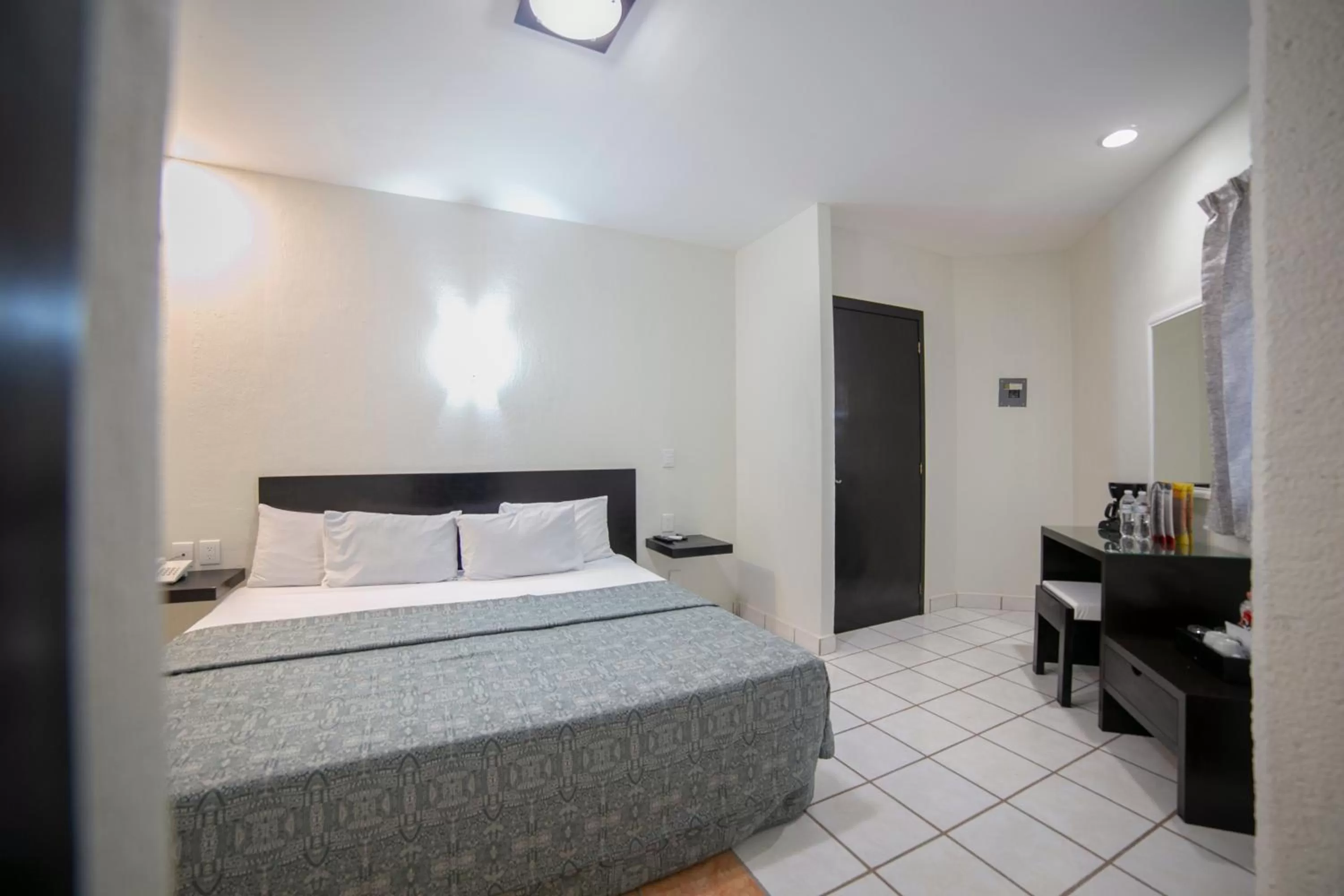 Photo of the whole room, Bed in Hotel RS Suites