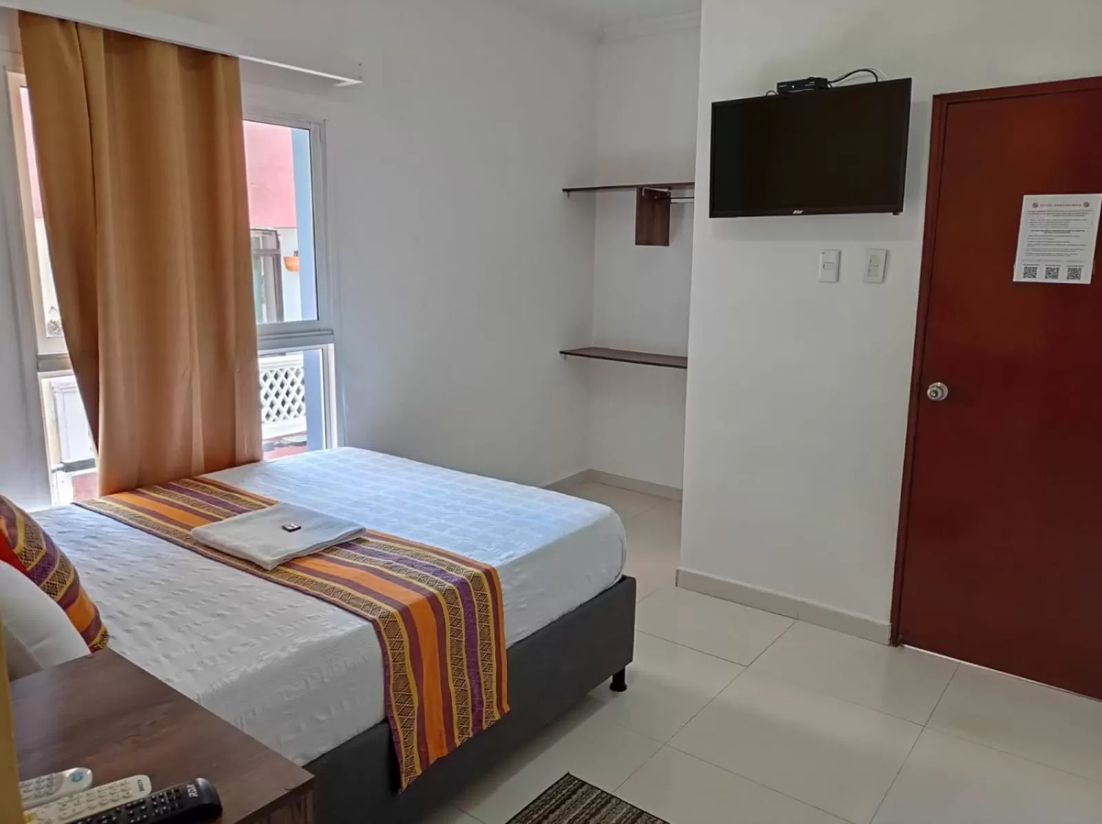 Bed in ANAJIRAWAA HOTEL