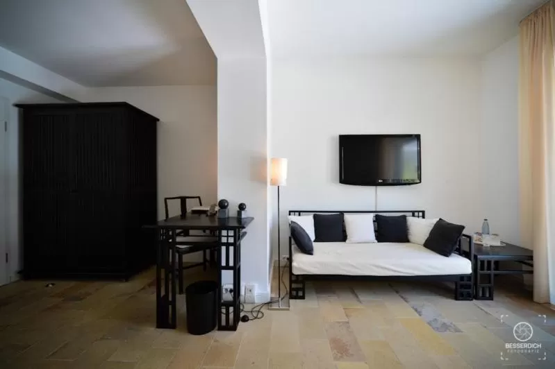 Seating area, Bed in Domaine Leidinger