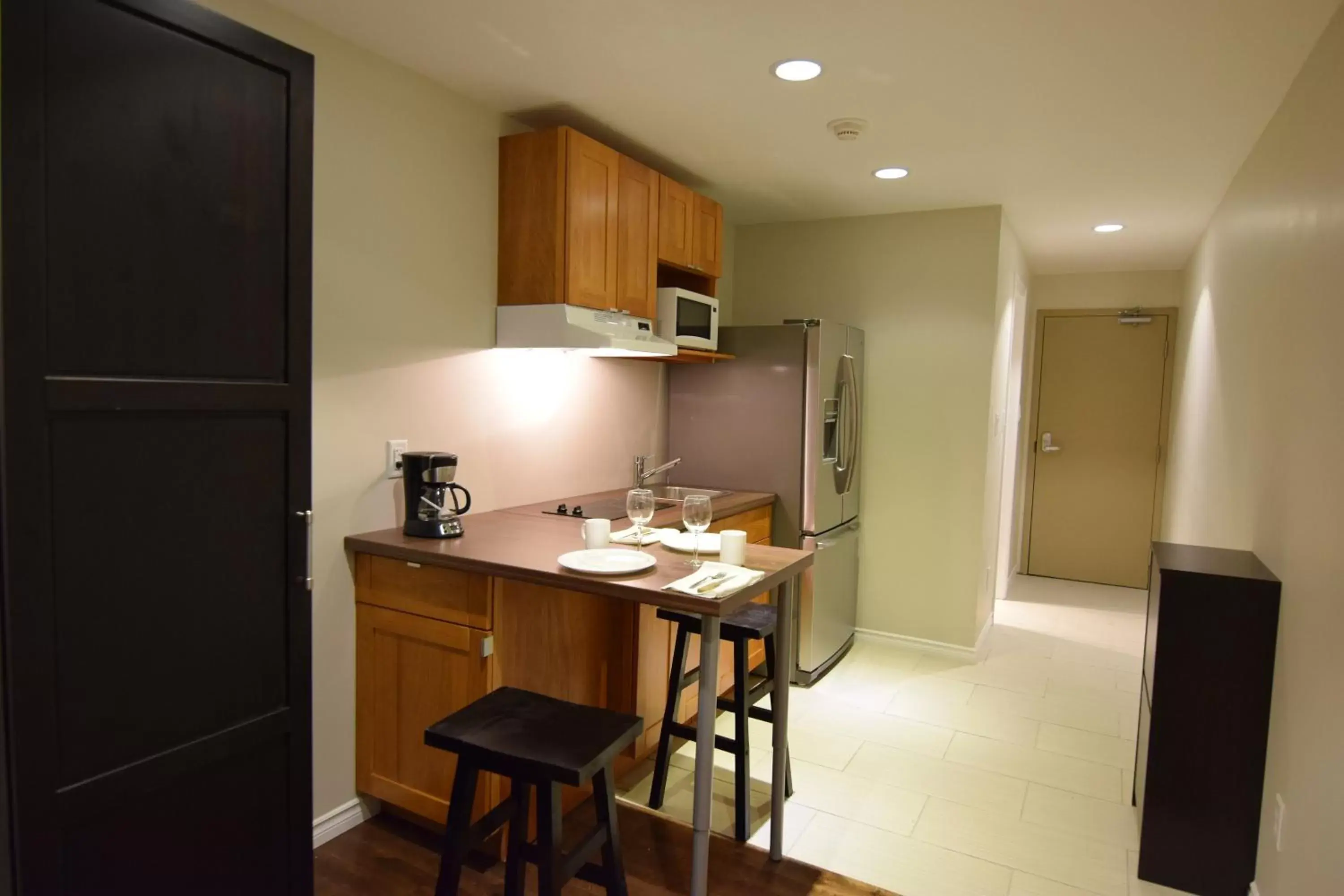 Kitchen or kitchenette, Kitchen/Kitchenette in The Lion Inn & Suites