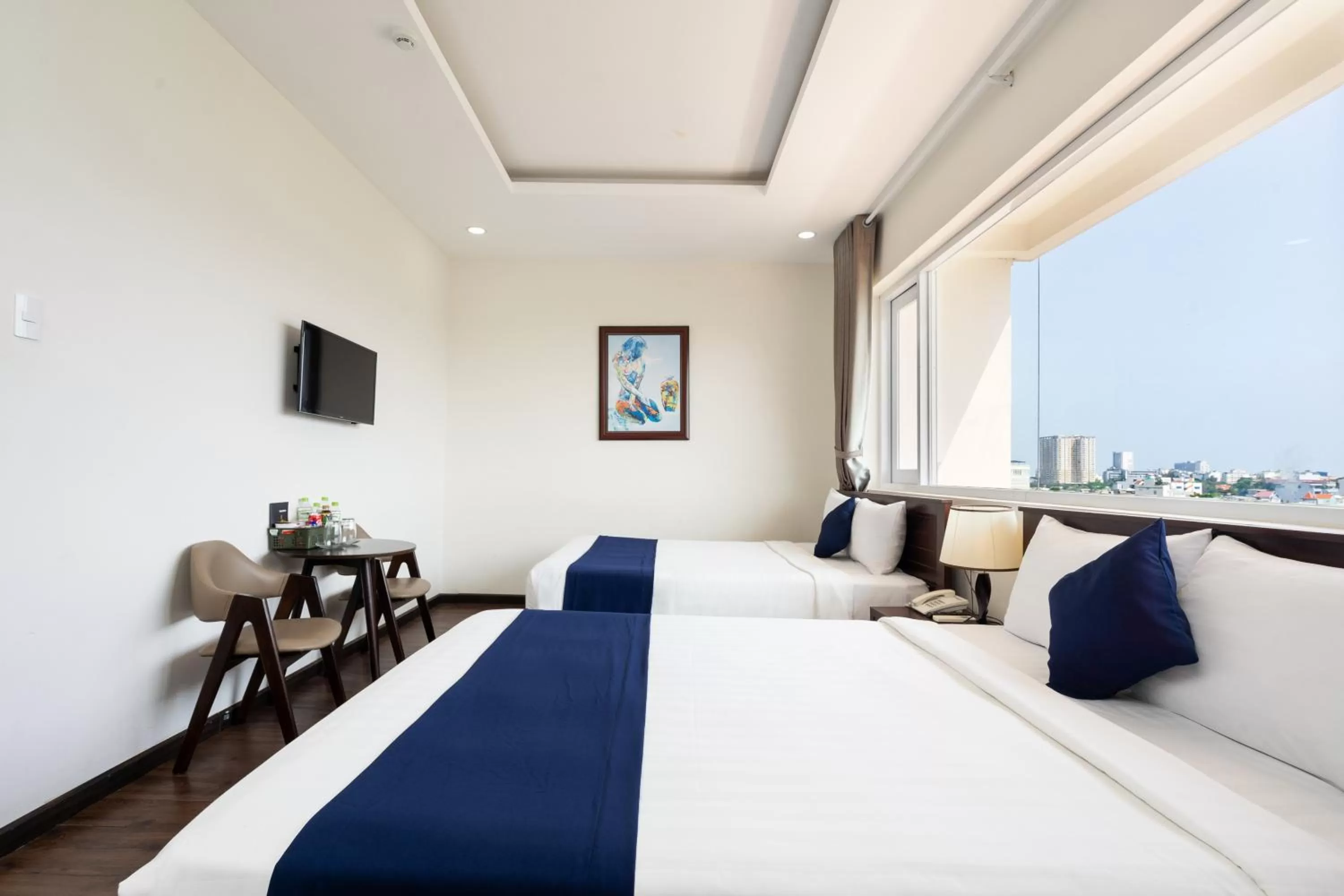 Bed in Central Hotel by Joi Hospitality