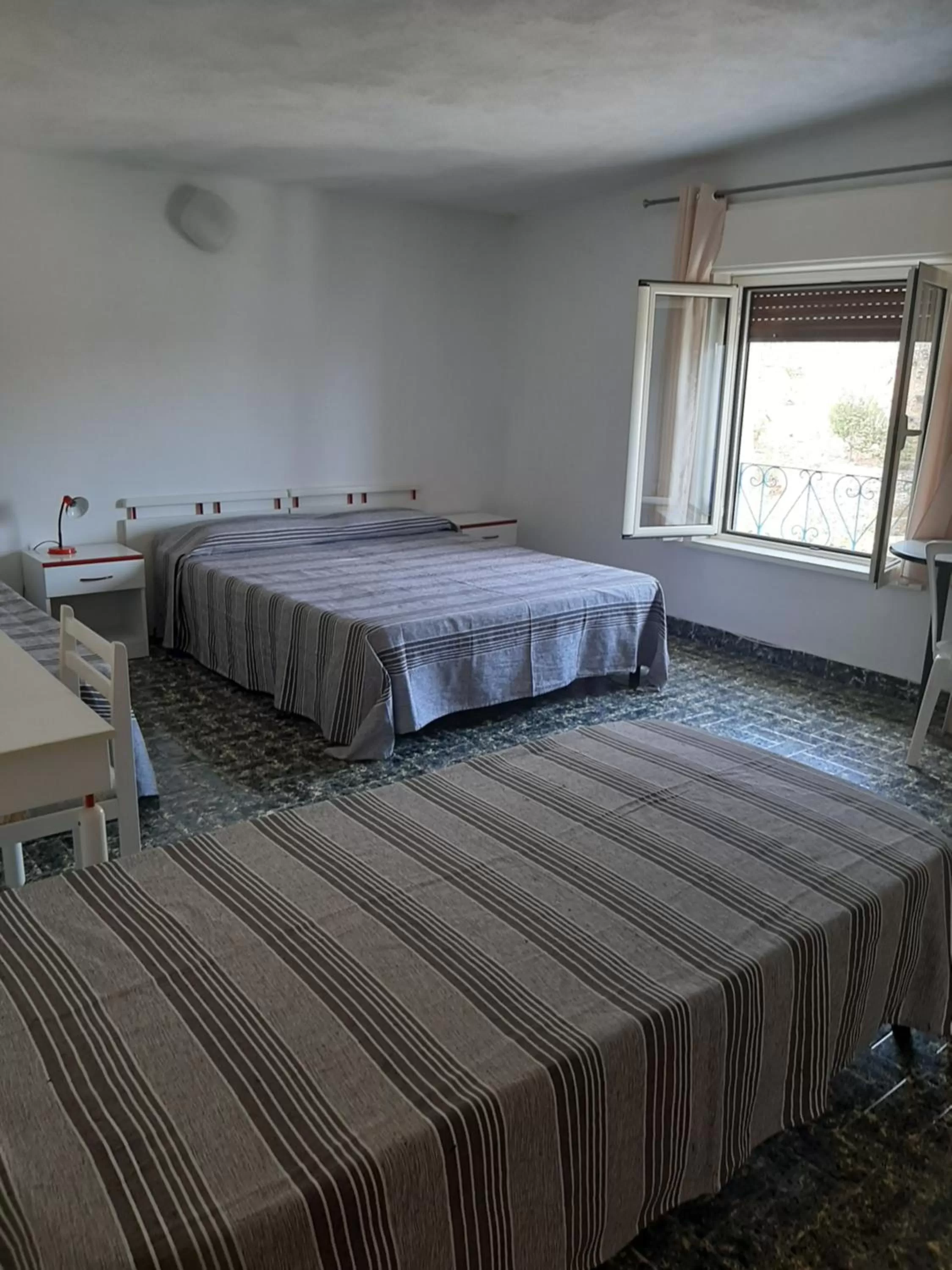 Bed in Hotel Conca d'Oro