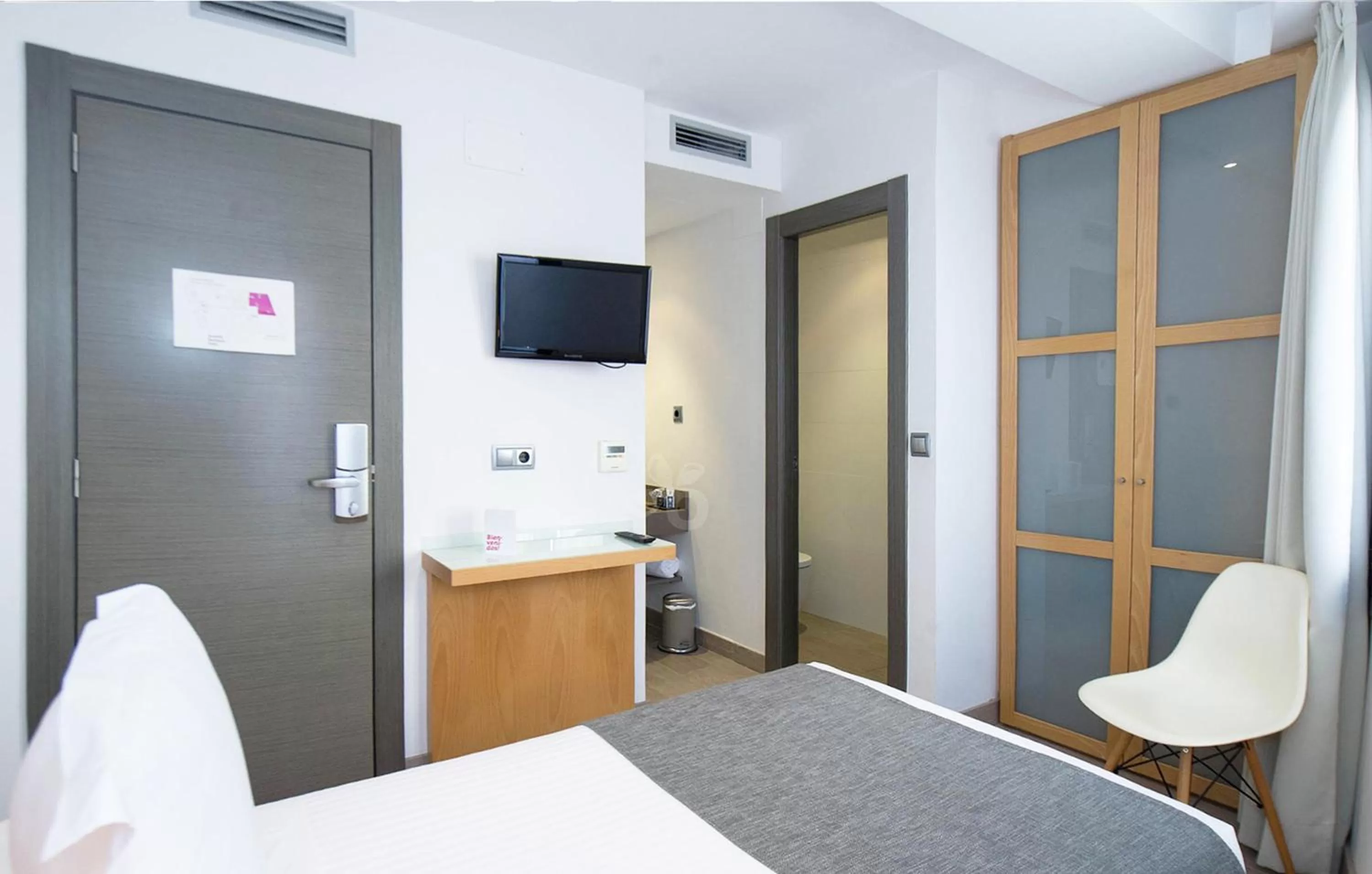 Bed in Le Petit Boutique Hotel