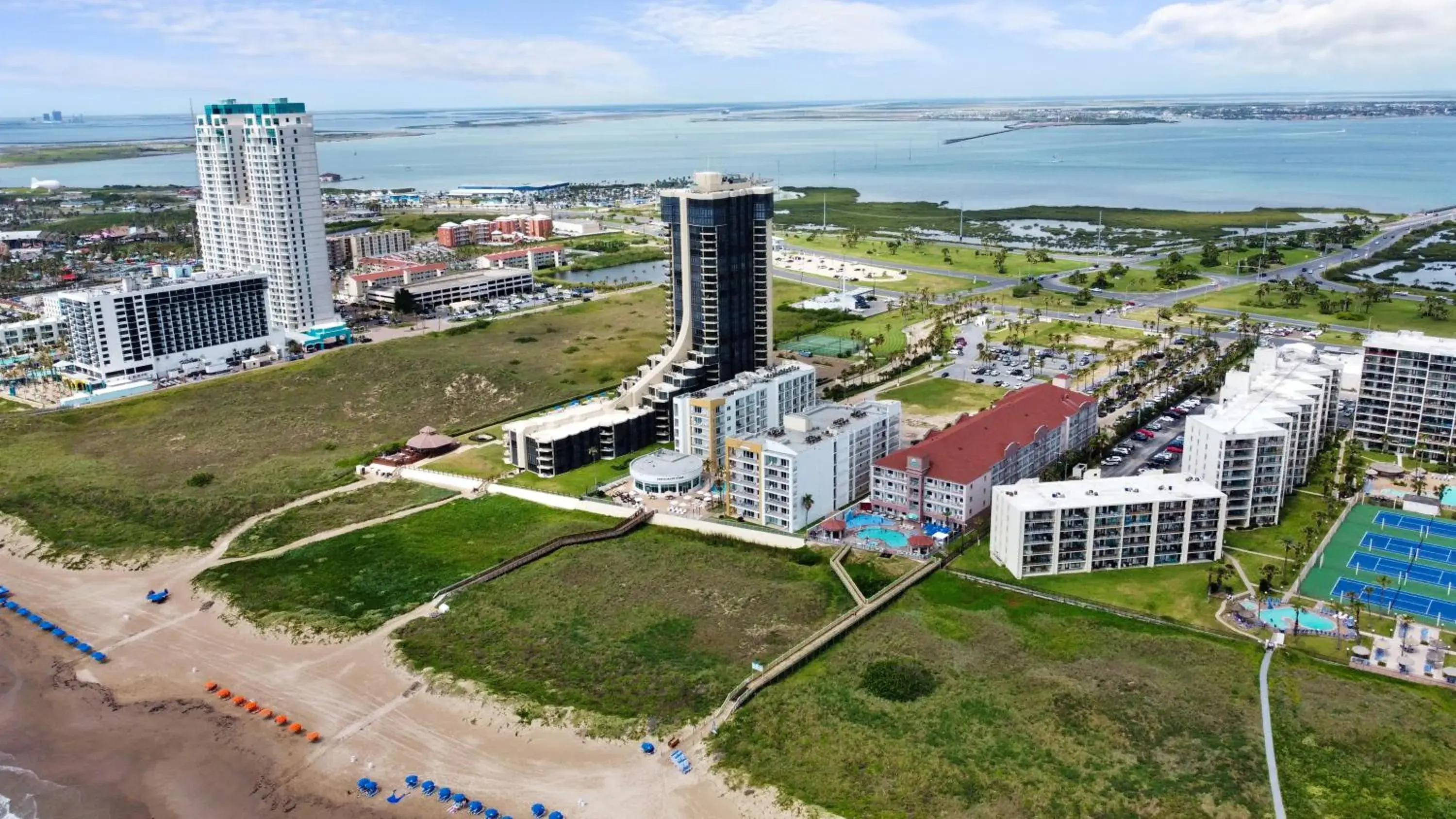 Property building in Peninsula Island Resort & Spa - Beachfront Property at South Padre Island Property building in Peninsula Island Resort & Spa - Beachfront Property at South Padre Island