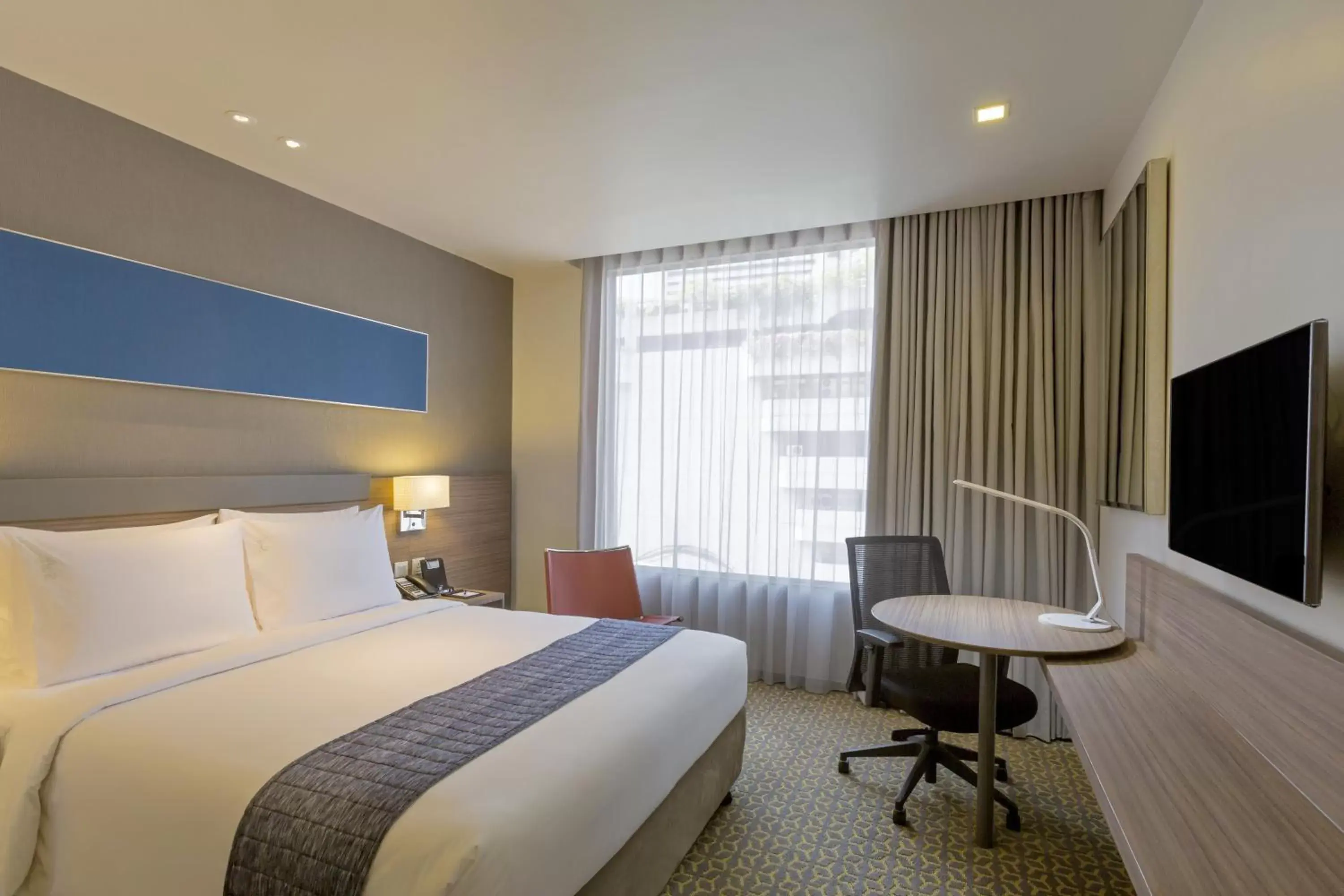 Photo of the whole room, Bed in Holiday Inn Express Bangkok Sathorn, an IHG Hotel