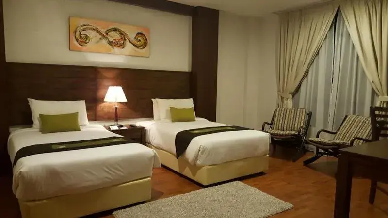 Bed in Samsuria Beach Resort & Residence