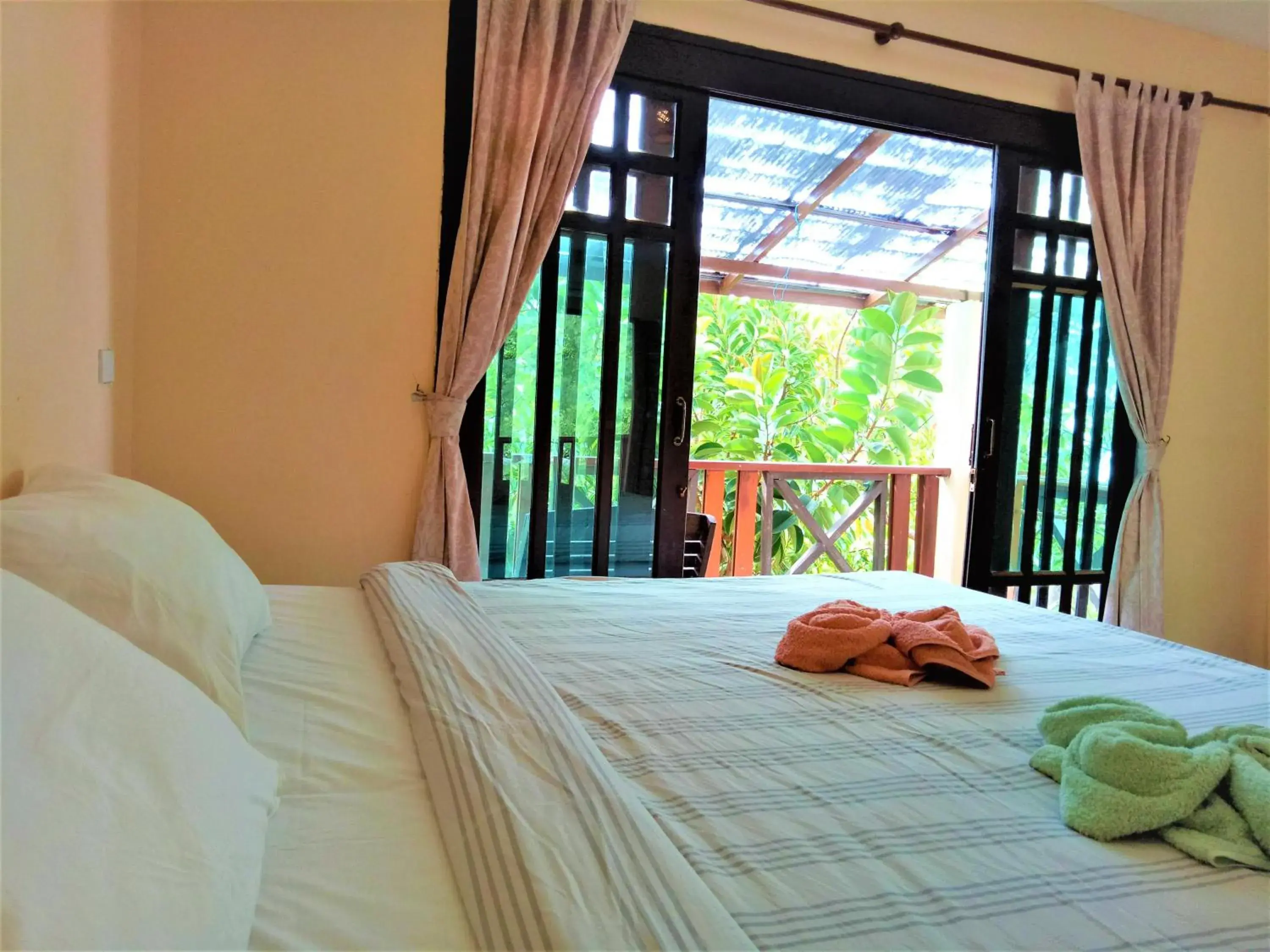 Bed in Banana Beach Resort