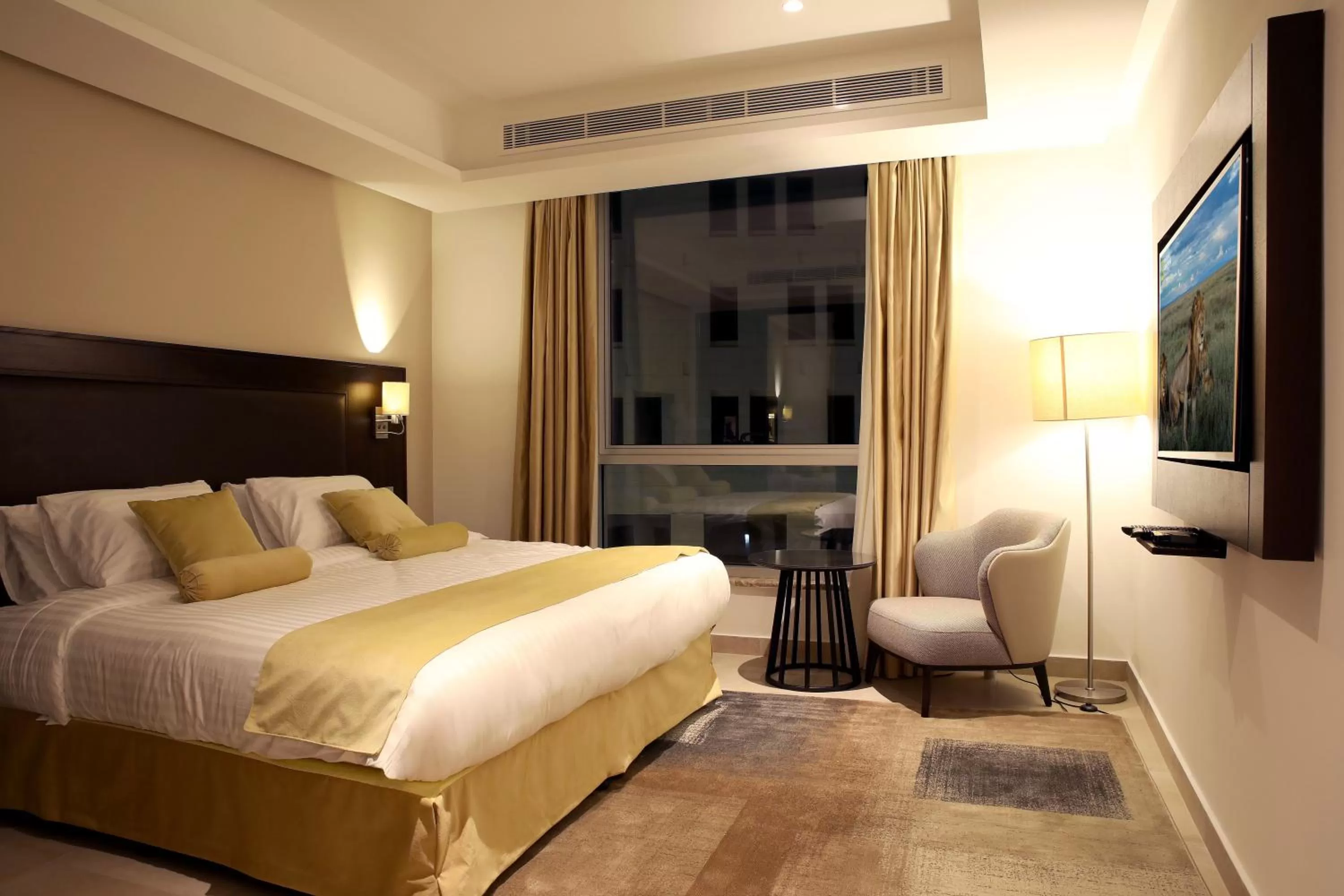 Bed in Downtown Hotel Apartments