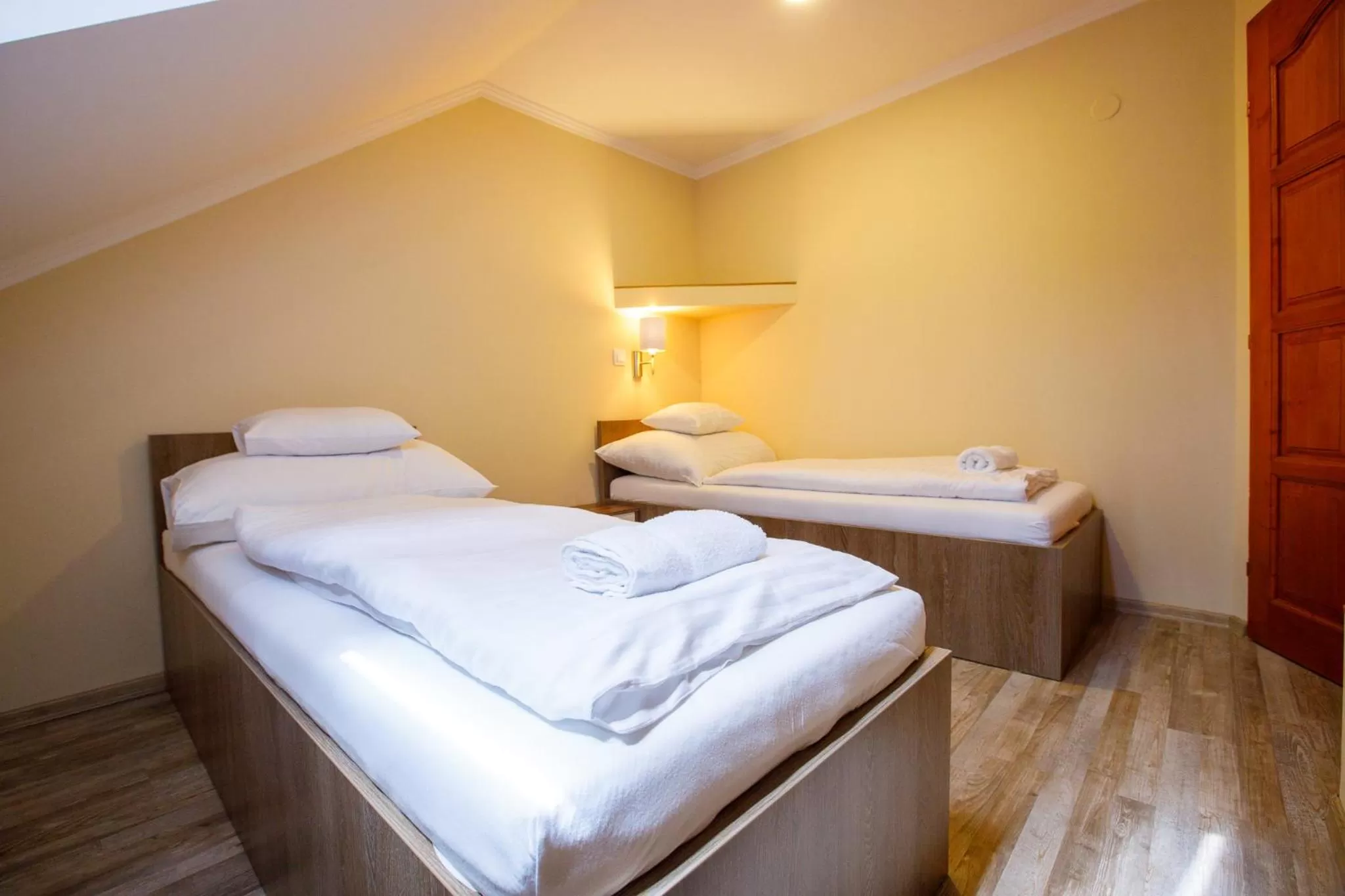 Bed in Central Panzió Gyula